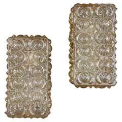 Pair of Helena Tynell style glass and metal one-light wall lamps. Germany, 1970s