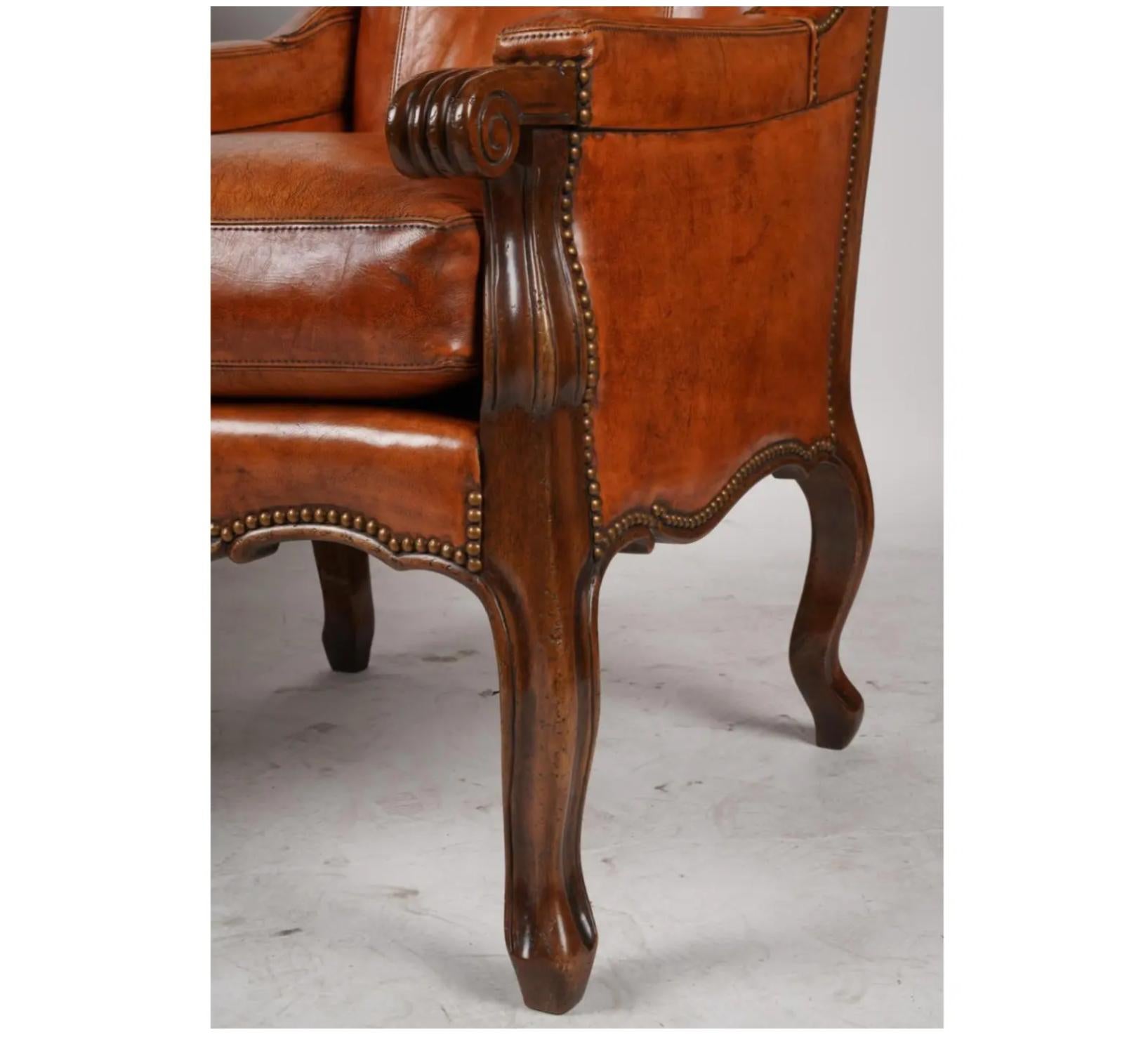 Pair of Hendrix Allardyce Italian Baroque Style Leather Wing Chairs.
