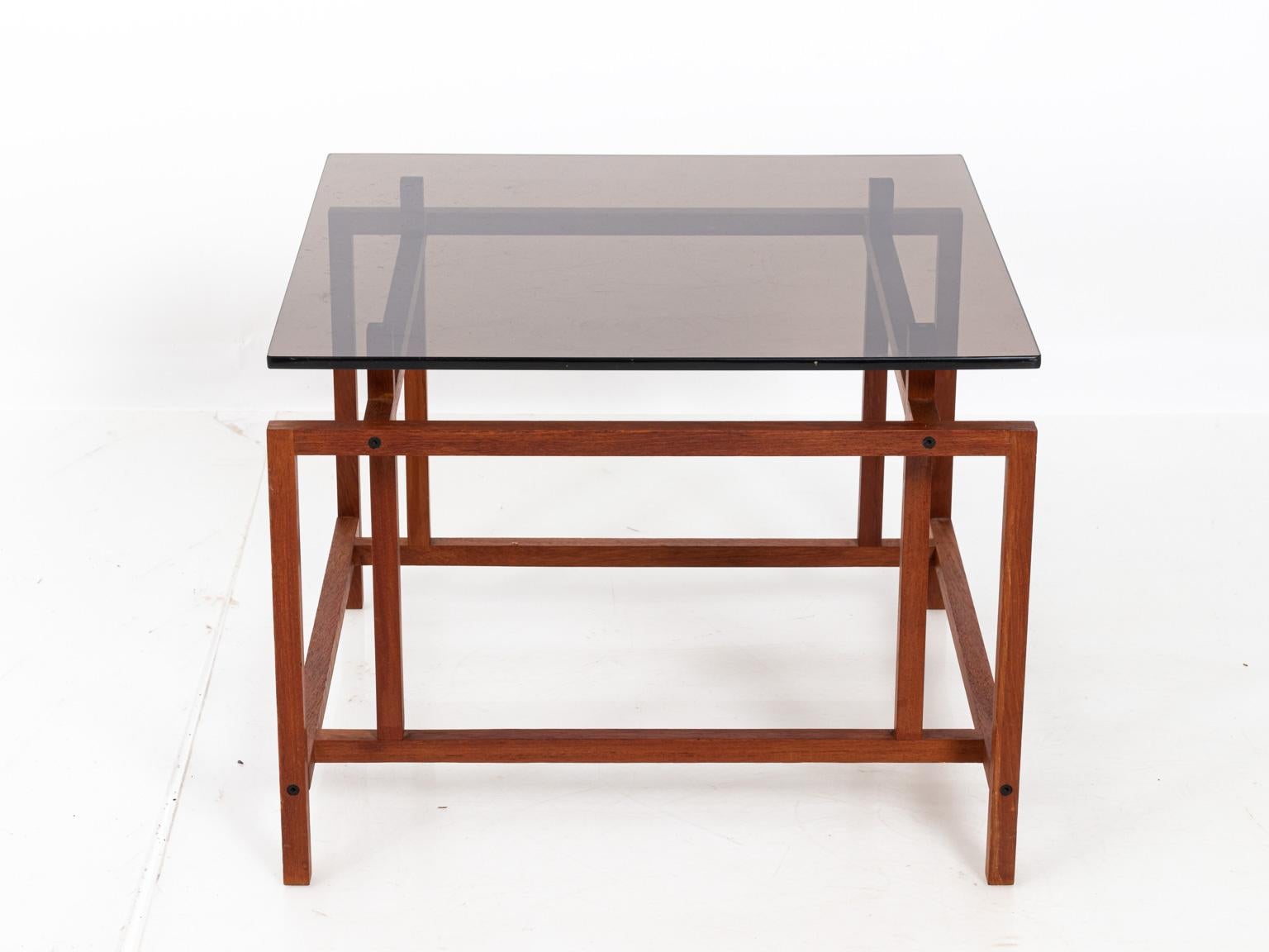 Pair of Henning Norgaard smoked Lucite Rosewood end tables by Komort Mobler. Made in Denmark. Please note of wear consistent with age.