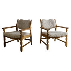 Pair of Henning Kjaernulf "Razor Blade" Armchairs in Oak and Sheepskin, 1960s