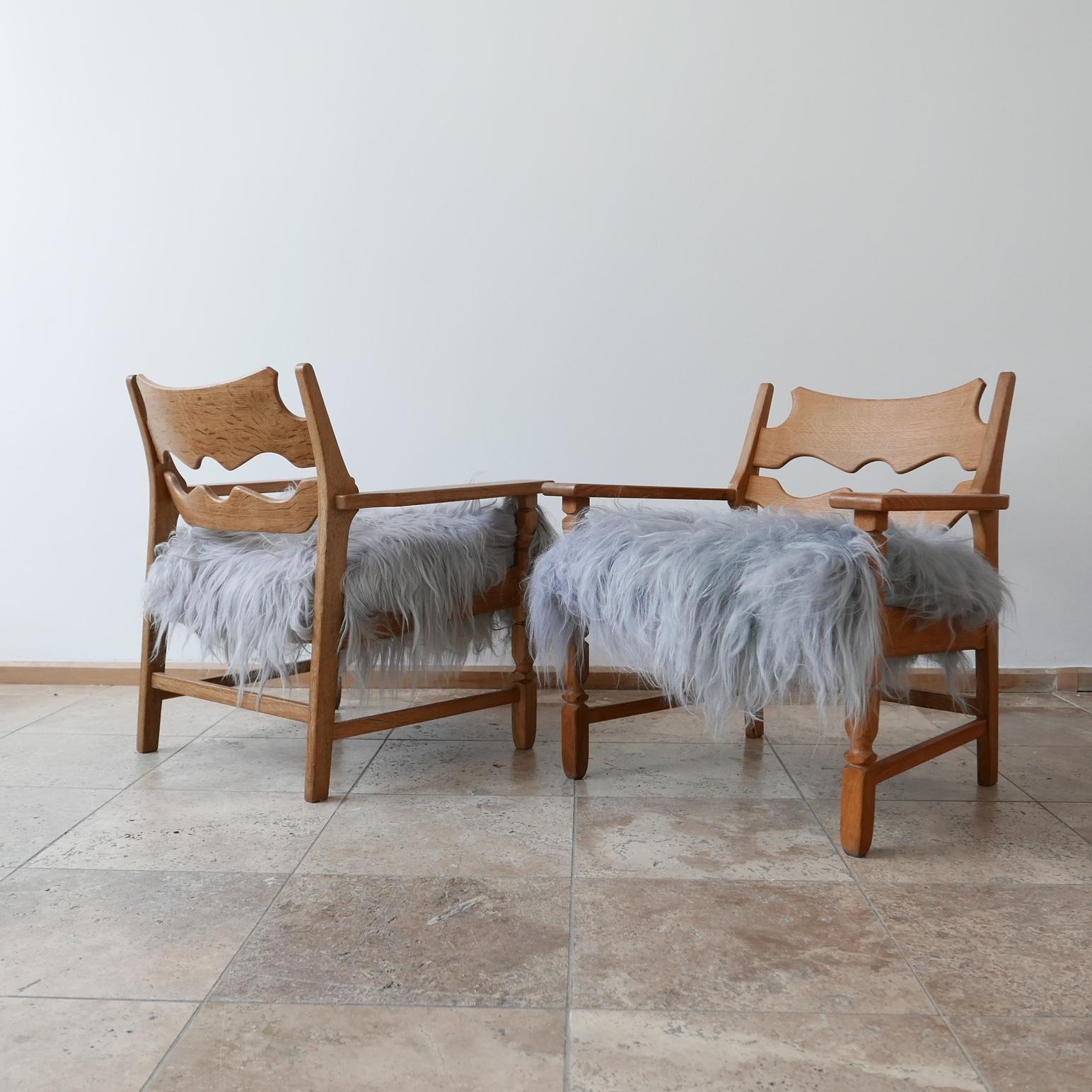 Pair of Henning Kjaernulf Sheepskin Razorblade Mid-Century Danish Armchairs In Good Condition In London, GB