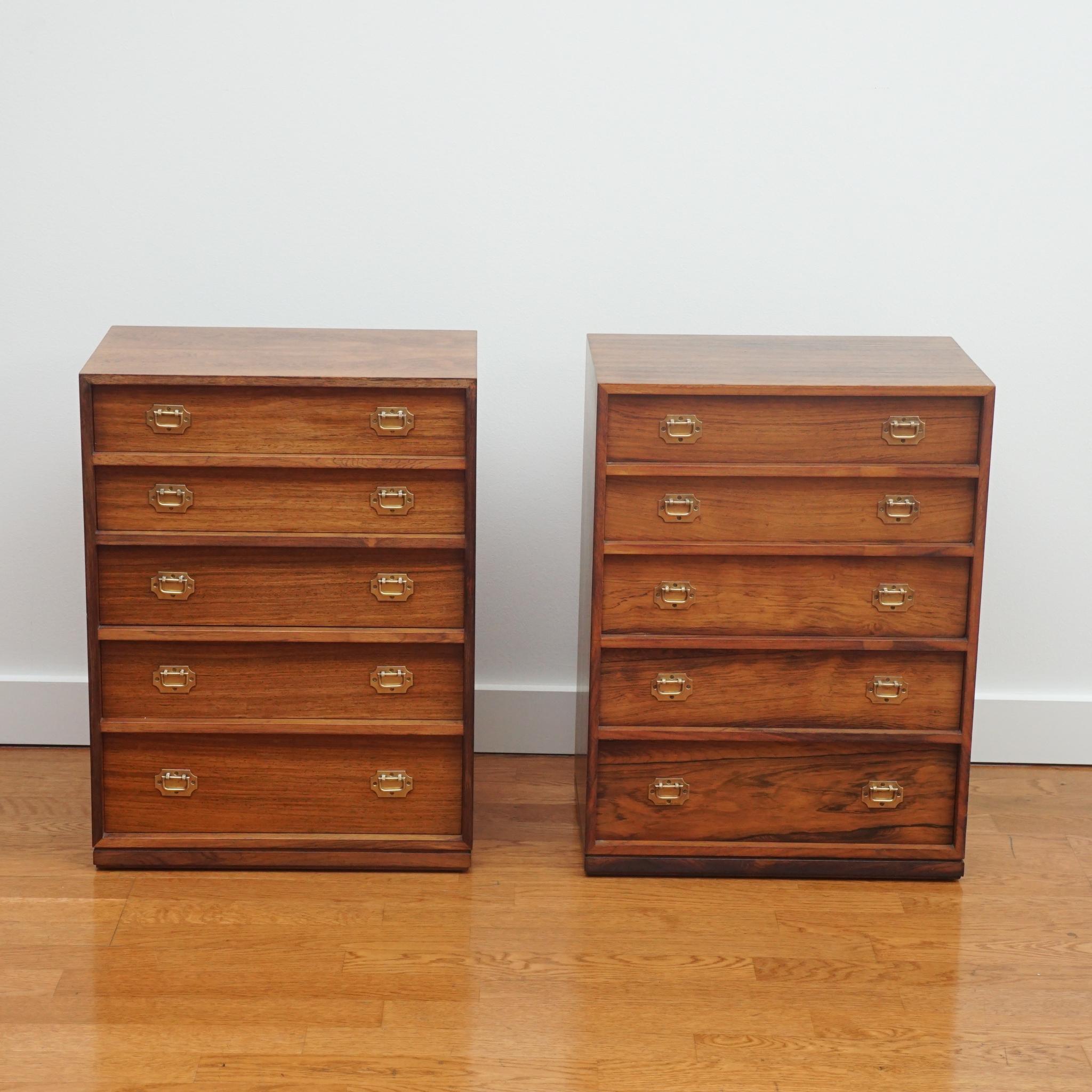 The pair of petite Danish mid-century nightstands, shown here, were designed by Henning Korch for Silkeborg Møbelfabrik. Fashioned after the designer's larger 