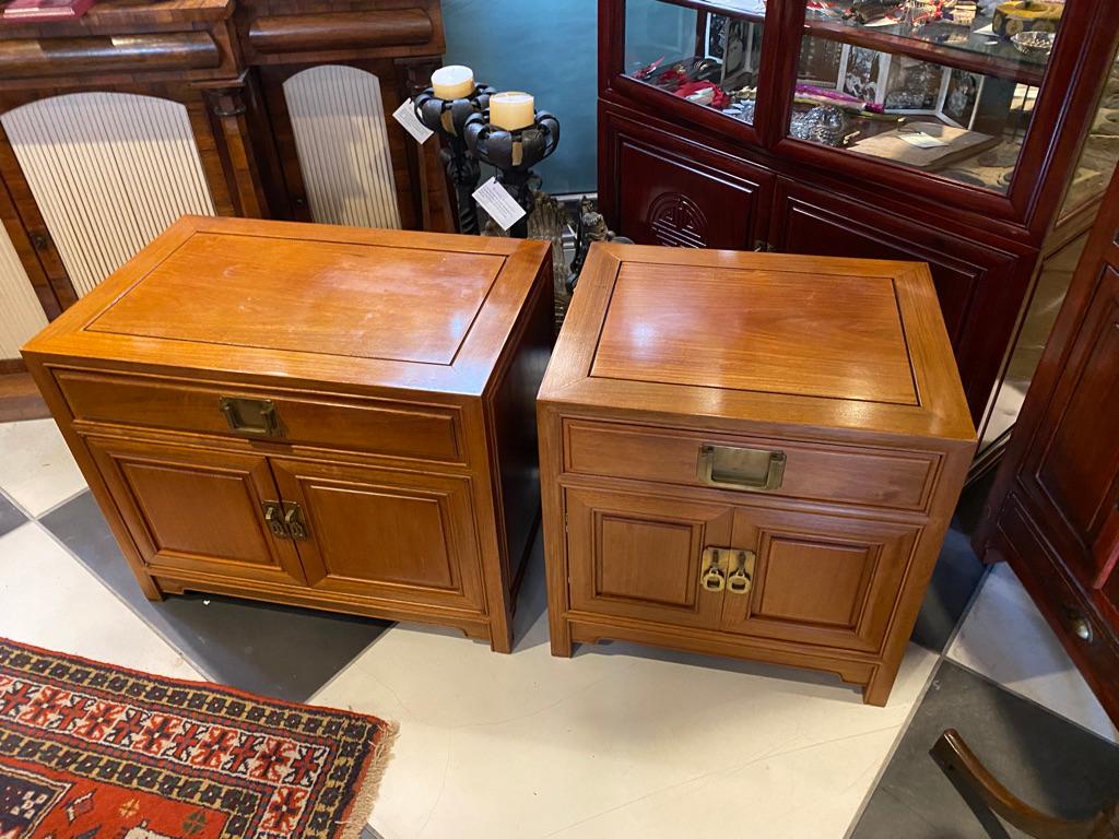 This special almost pair of night stands / side table cabinets (one is wider than the other.
brass trim pulls one drawer each and 2 doors to the bottom in the style of Asian Mid-Century Modern
From a wealth estate also having a dresser to match
