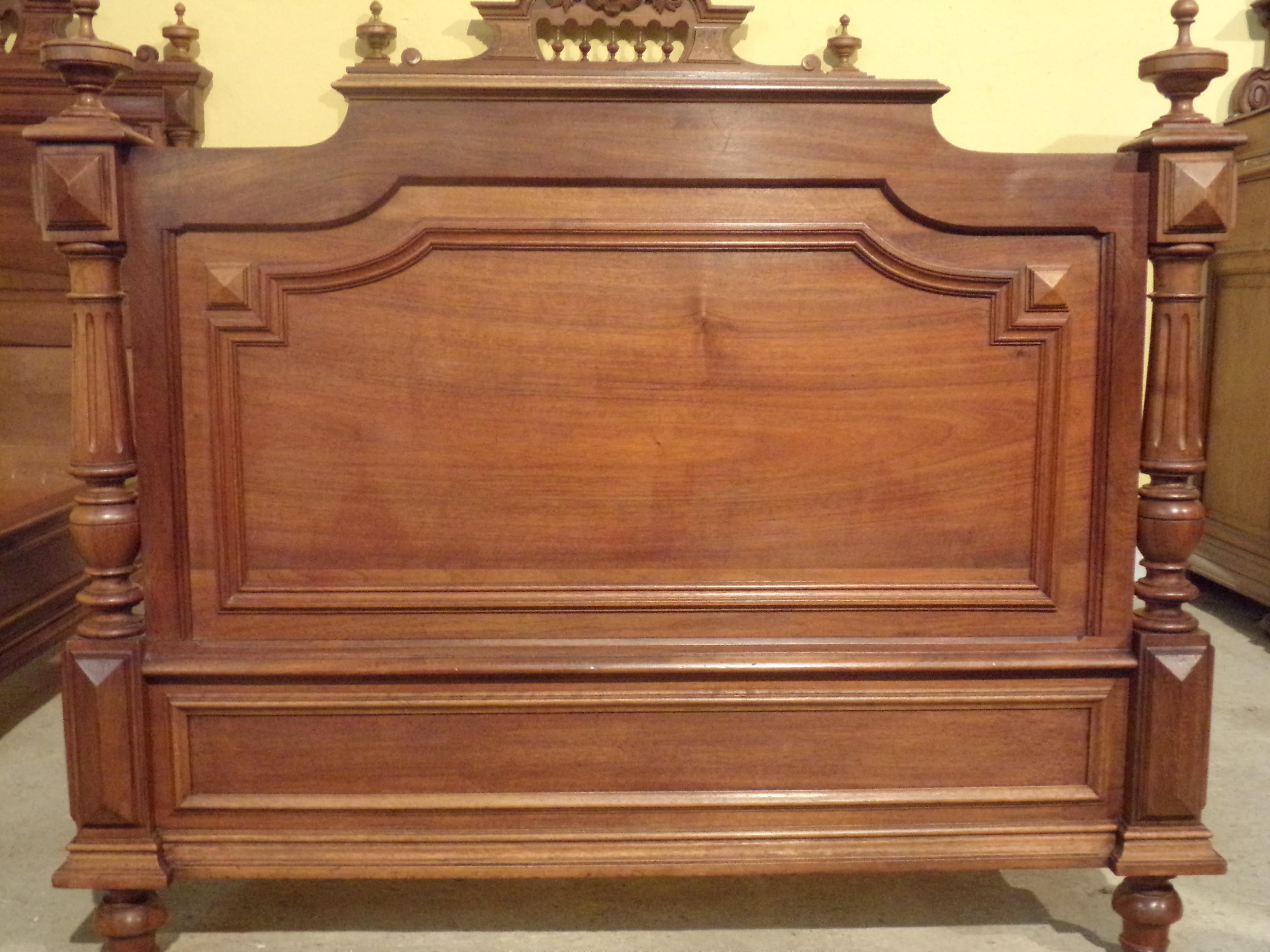 A fine pair of solid Walnut beds in the Henri II style C1880. Made and carved by a master cabinet maker in the Bordeaux area of Western France. 
This fine pair can either be used as 4 foot singles or could be linked to provide a massive King plus