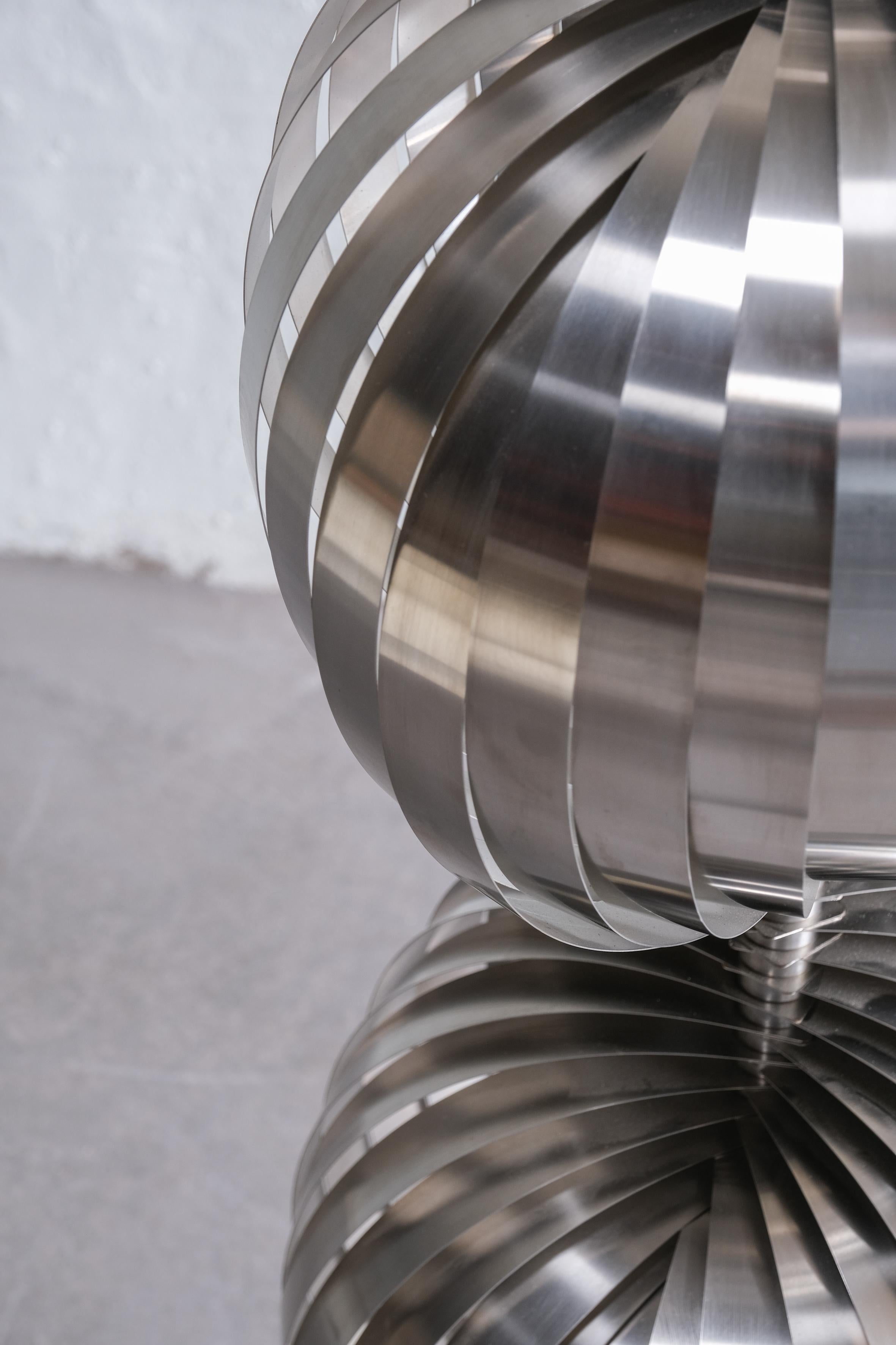 Aluminum Pair of Henri Mathieu metal spiral floorlamps from the 70ties