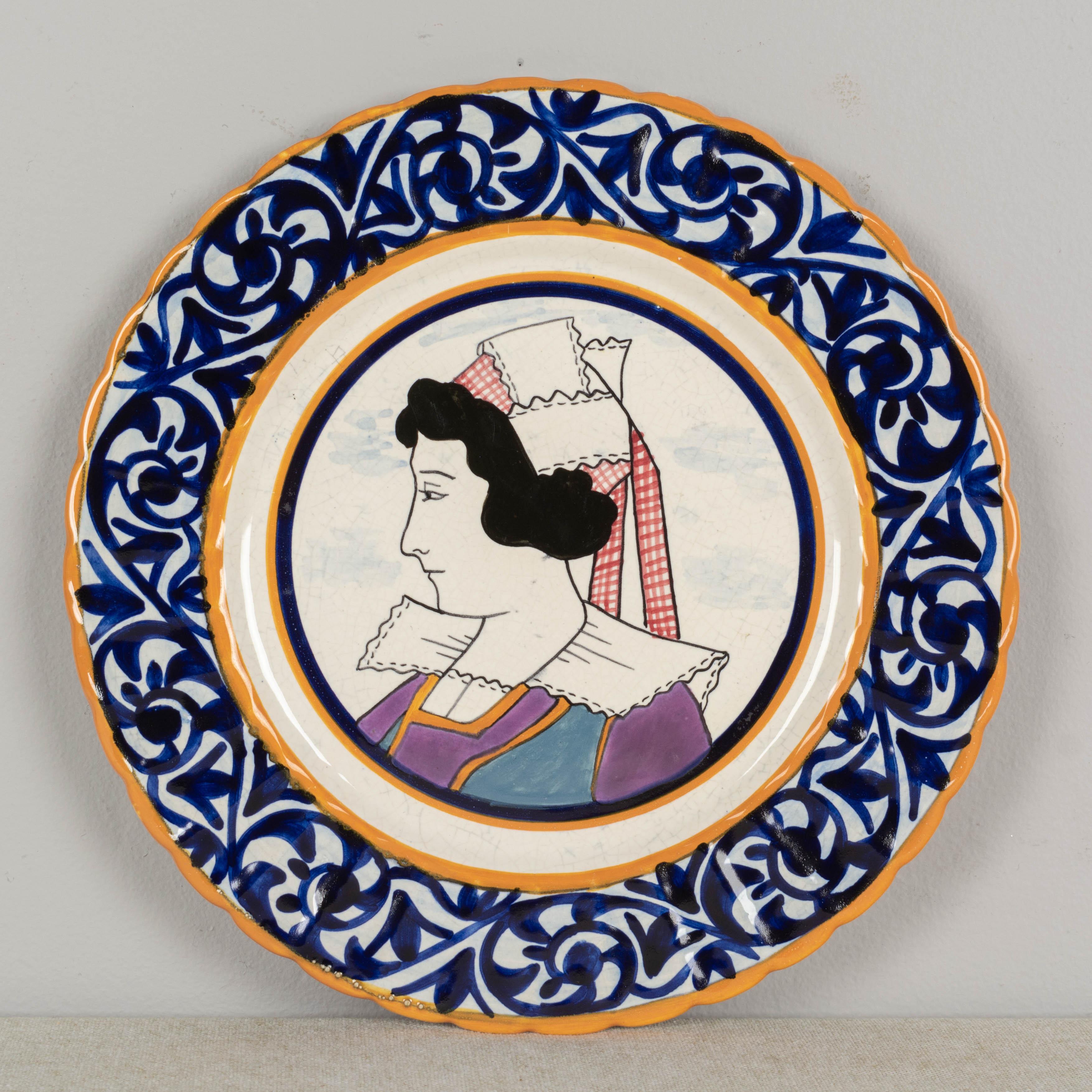 Hand-Painted Pair of French Henriot Quimper Faience Plates For Sale