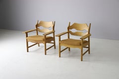 Pair of Henry Kjaernulf 'razor blade' chairs in patinated oak,  Denmark 1960s