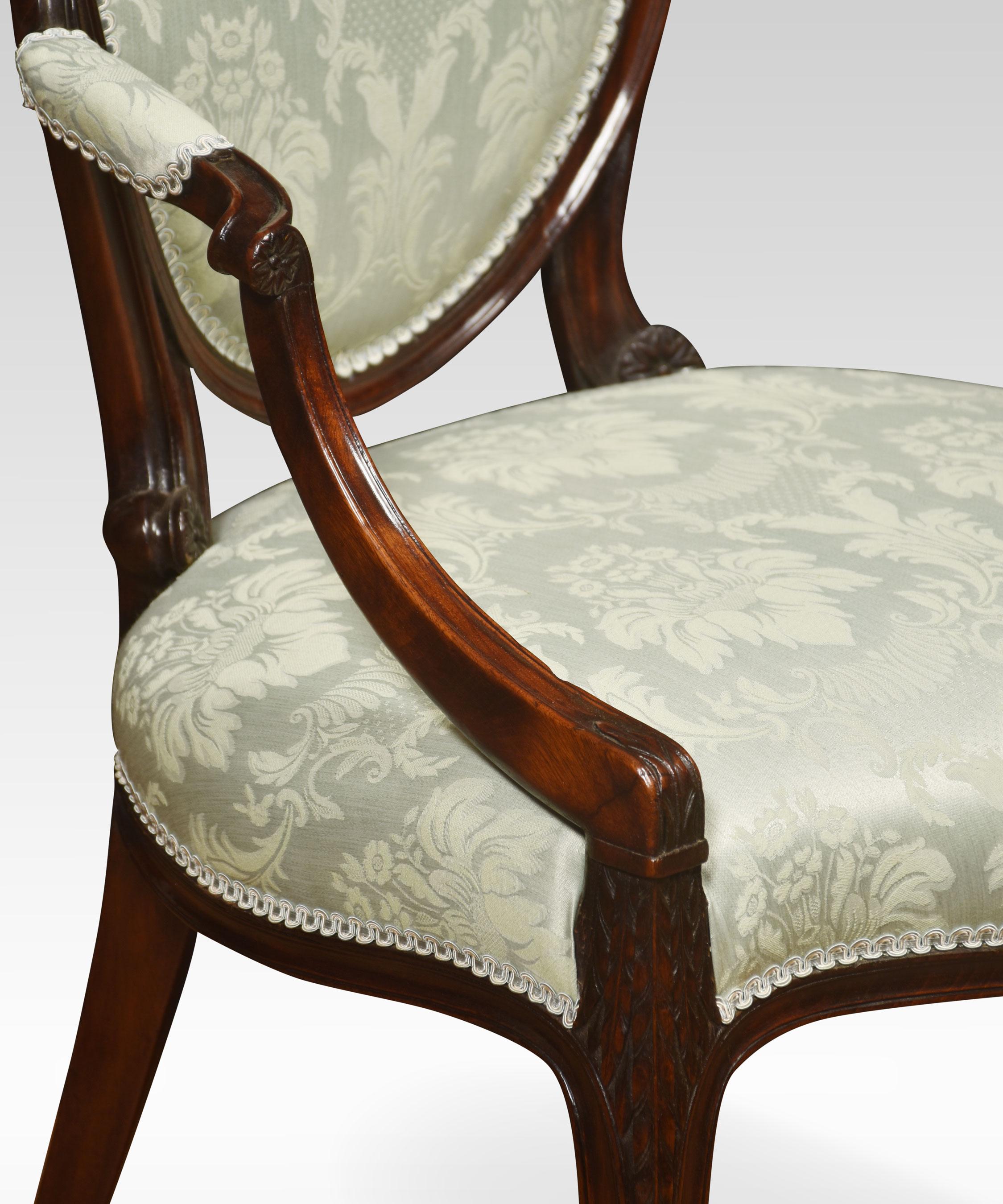 Pair of Hepplewhite style mahogany armchairs, the oval backs and out-swept arms upholstered in green damask fabric raised up on slender cabriolet supports.
Dimensions
Height 40 Inches height to seat 18.5 Inches
Width 24 Inches
Depth 23 Inches.