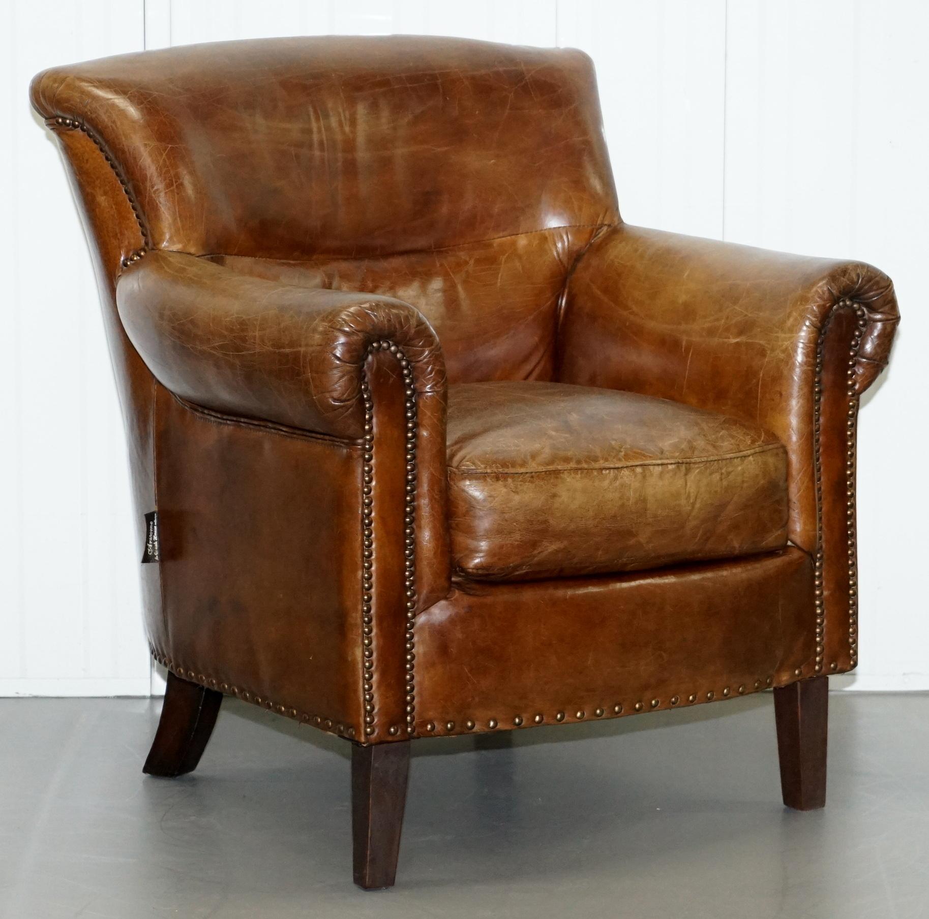 We are delighted to offer for sale this stunning pair of vintage aged brown leather club armchairs

A very good looking and decorative pair of comfortable armchairs, these are upholstered with natural fully aniline leather which is hand dyed six