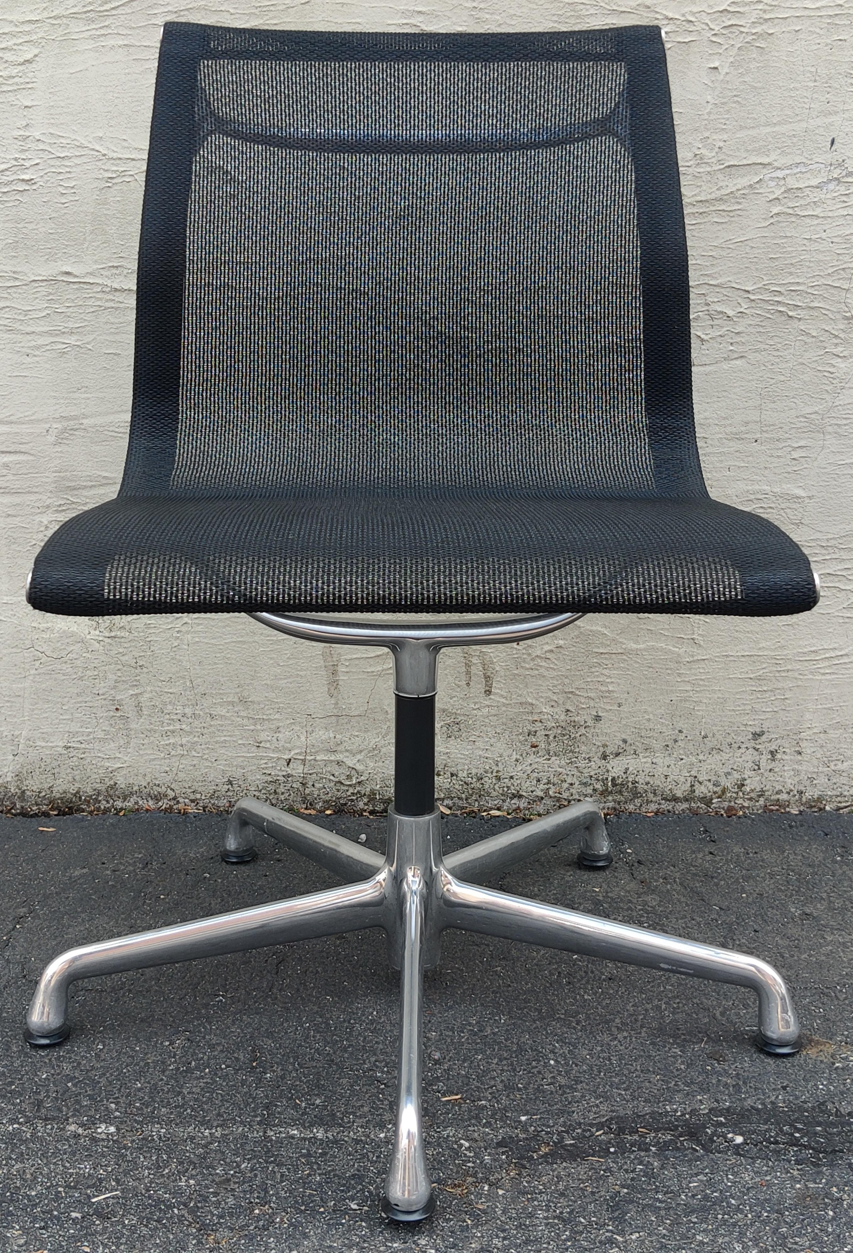 This line of chairs was conceived in the 1960s by Charles and Ray Eames for Herman Miller. Over the years, the line has evolved into many variants and been dubbed Aluminum Group. This pair of chairs has 5 prong bases and no arms for a design with
