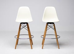 Pair of Herman Miller White Fiberglass Charles & Ray Eames "PSW" Barstools
