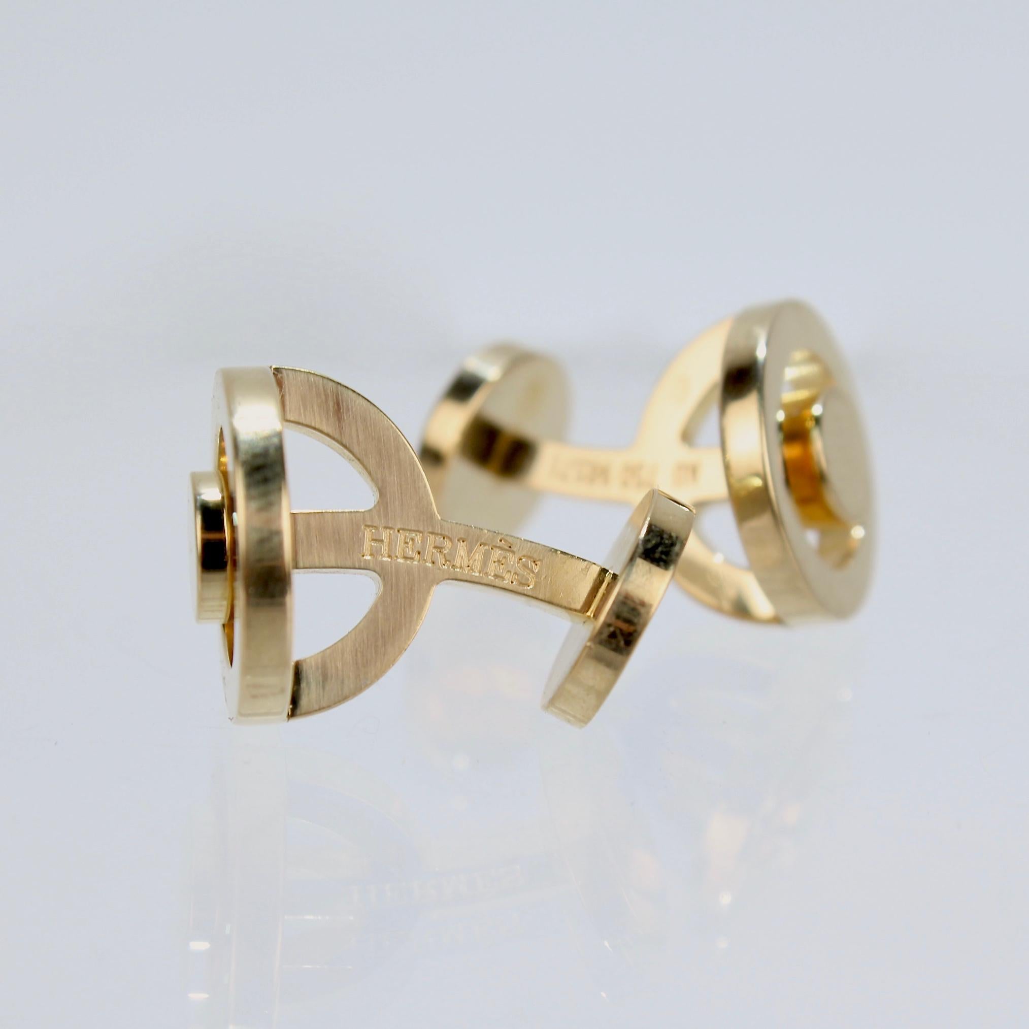 gold hermes cufflinks