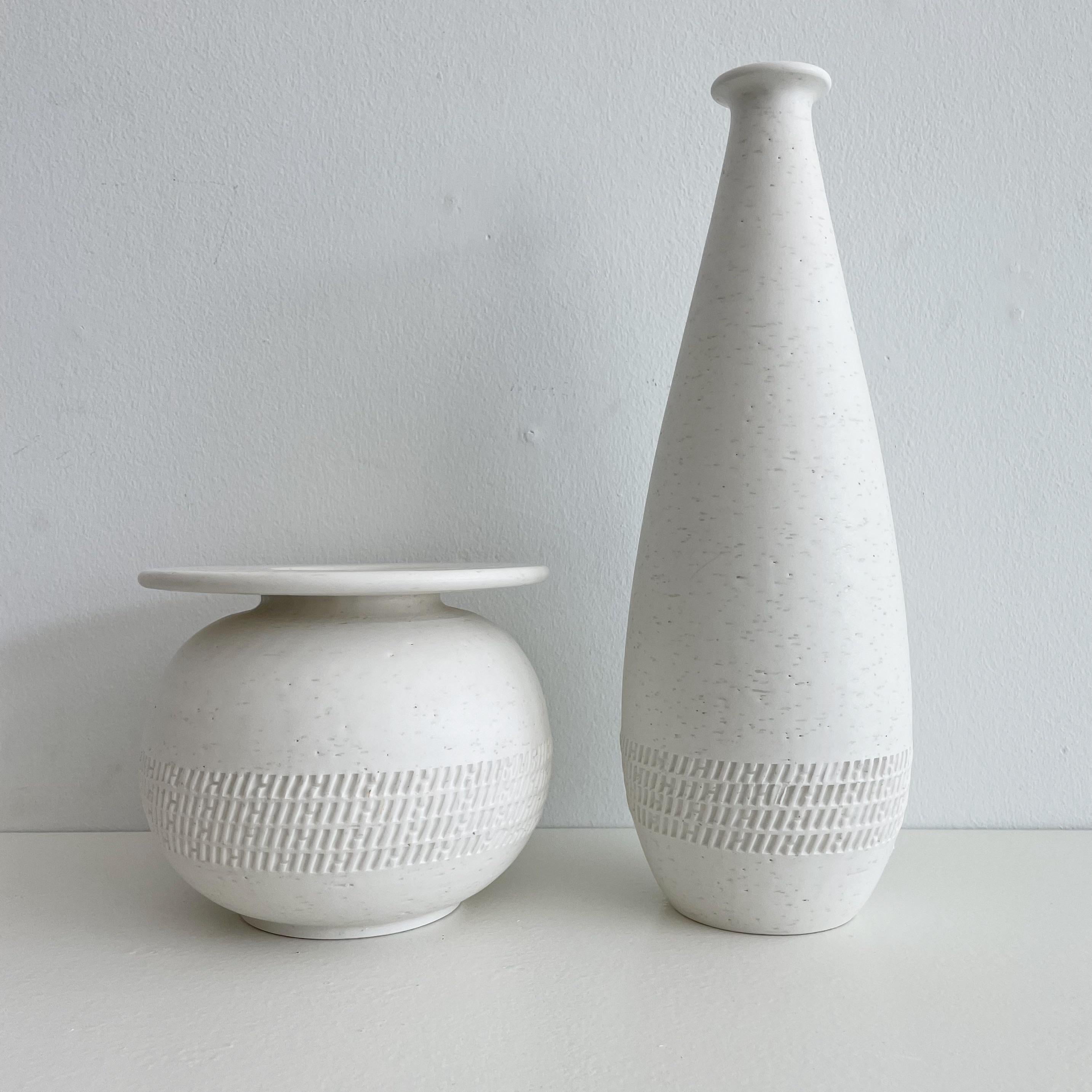 Pair of organic white vases with incised H's by Hermes Paris circa 2000. 
Smaller example measures: 7