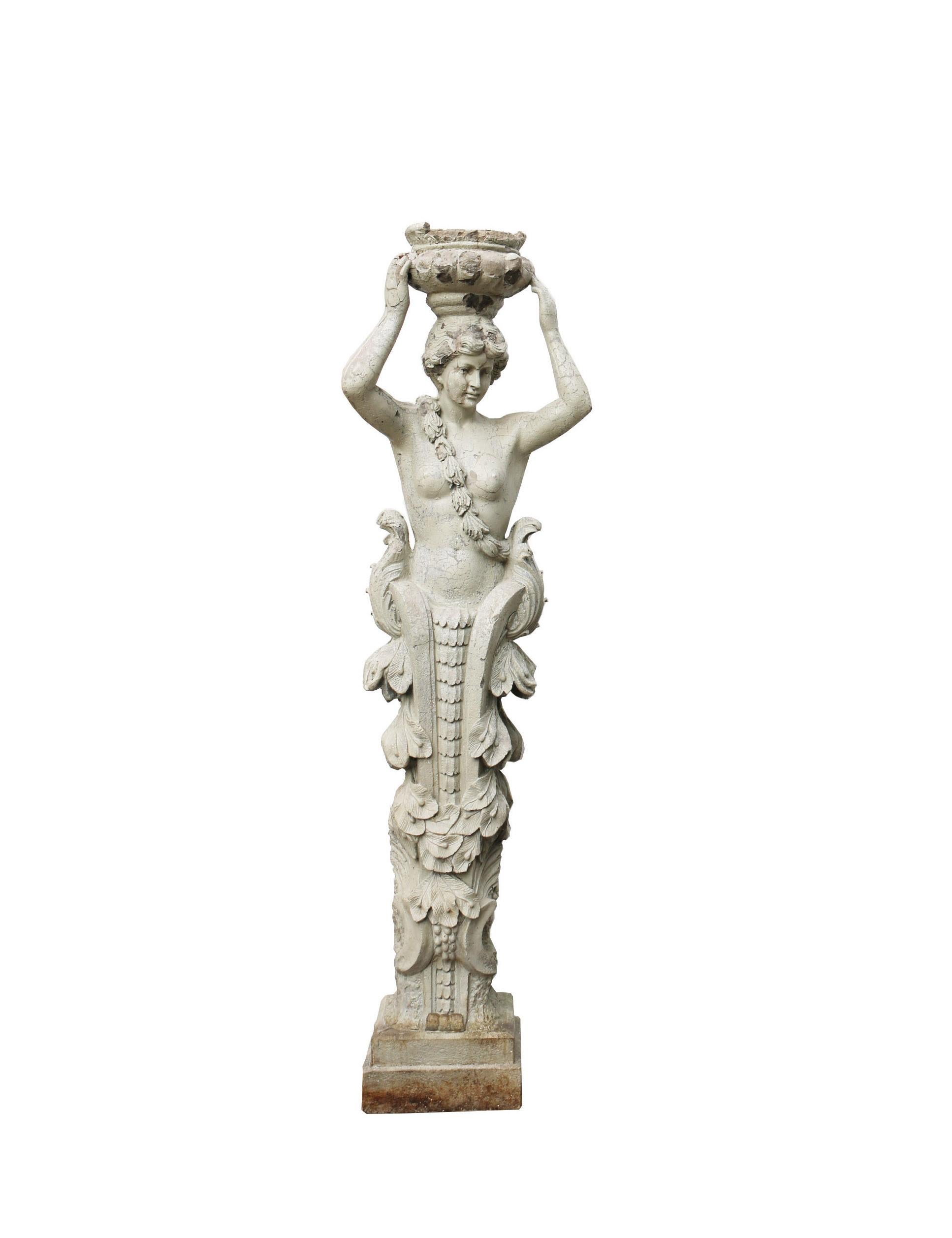 About

These highly decorative composition Herms depict a Caryatid and Atlas. Suitable for interior or exterior use. The urns held above the heads have previously been used for plants. European origin, possibly Italian. 

Condition