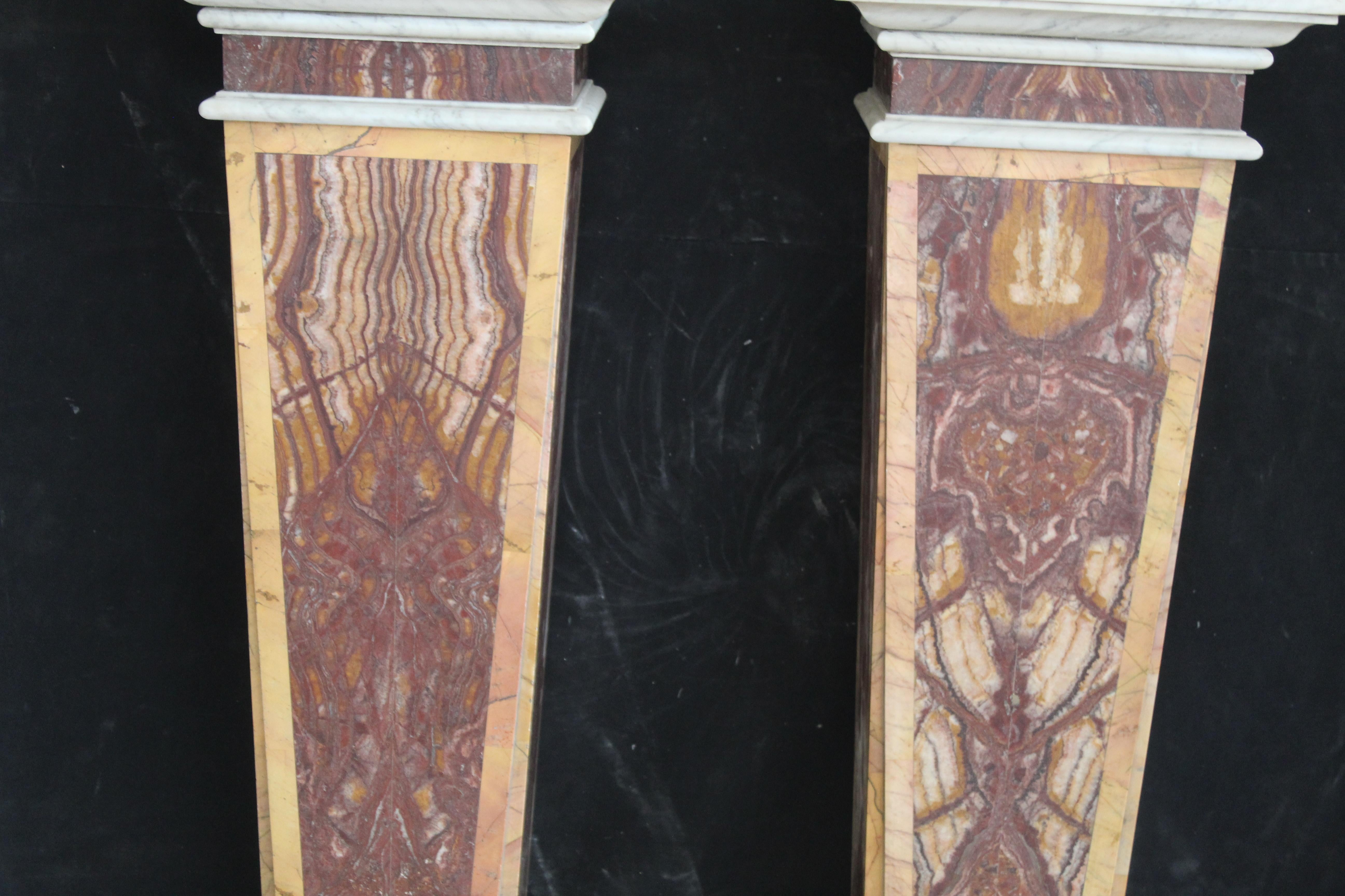 Marble Pair of herms in red marble For Sale