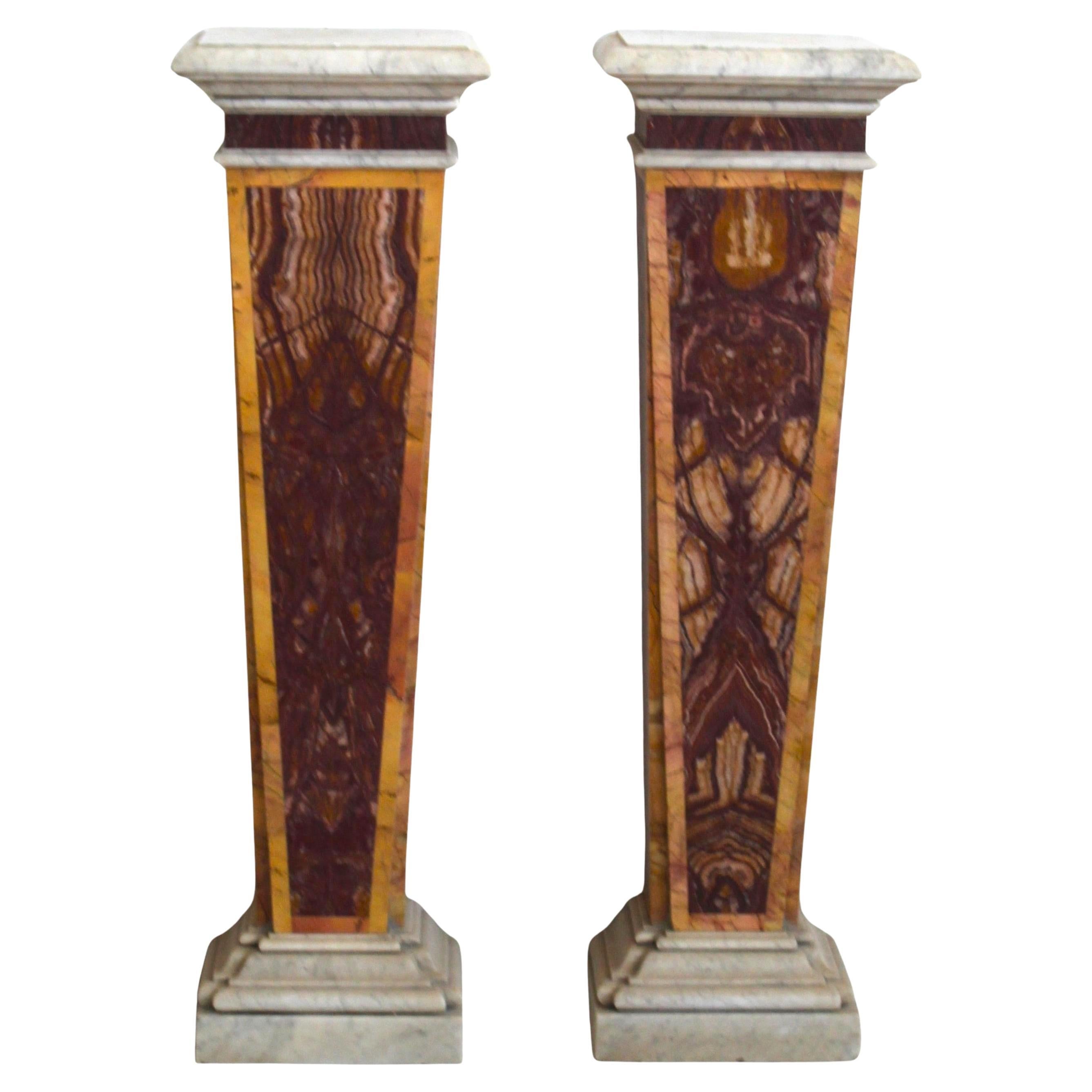 Pair of herms in red marble For Sale