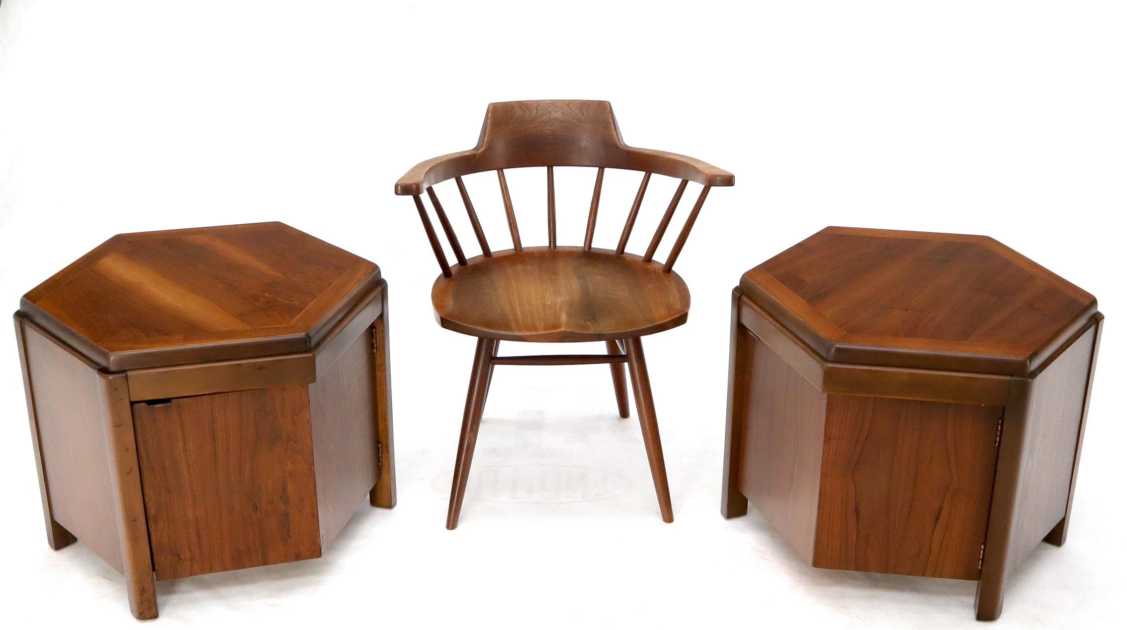 Mid-Century Modern pair of walnut hexagon shape one door storage compartment end side tables.