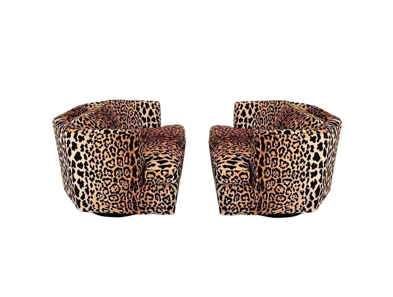 These jaw dropping chairs bring some serious leopard love! Of well proportioned hexagonal shaped club lounge chairs in the style of Milo Baughman, circa 1980's. The faceted design is the prime feature creating a striking profile of the chair. The