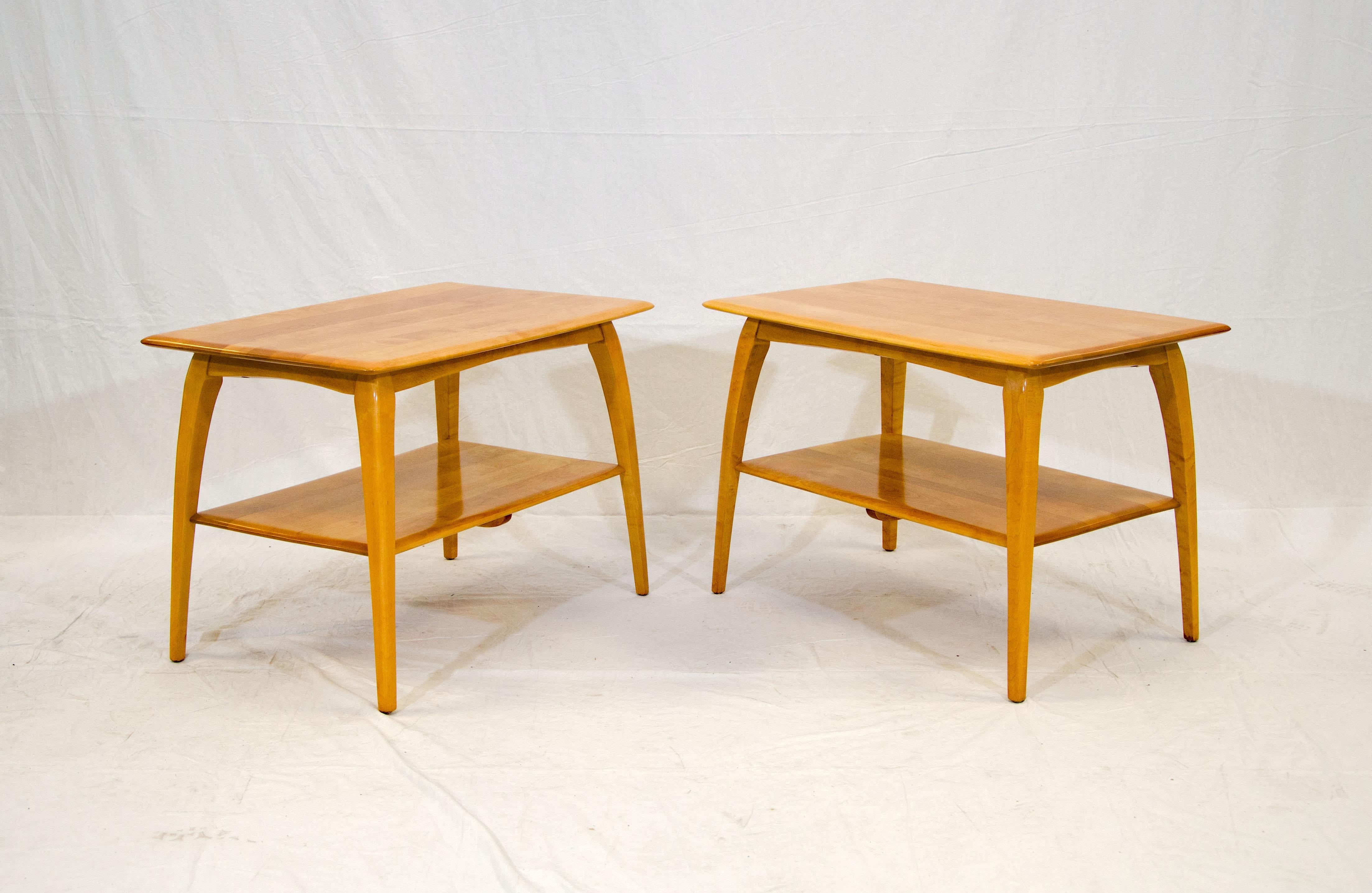 Nice pair of Heywood Wakefield end tables to use beside a sofa or next to a pair of lounge chairs. The second shelf measures about 9 1/2