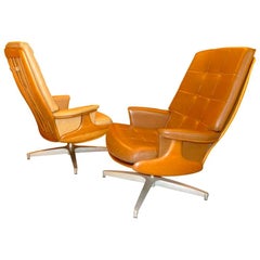 Pair of Heywood Wakefield Swivel Lounge Chairs