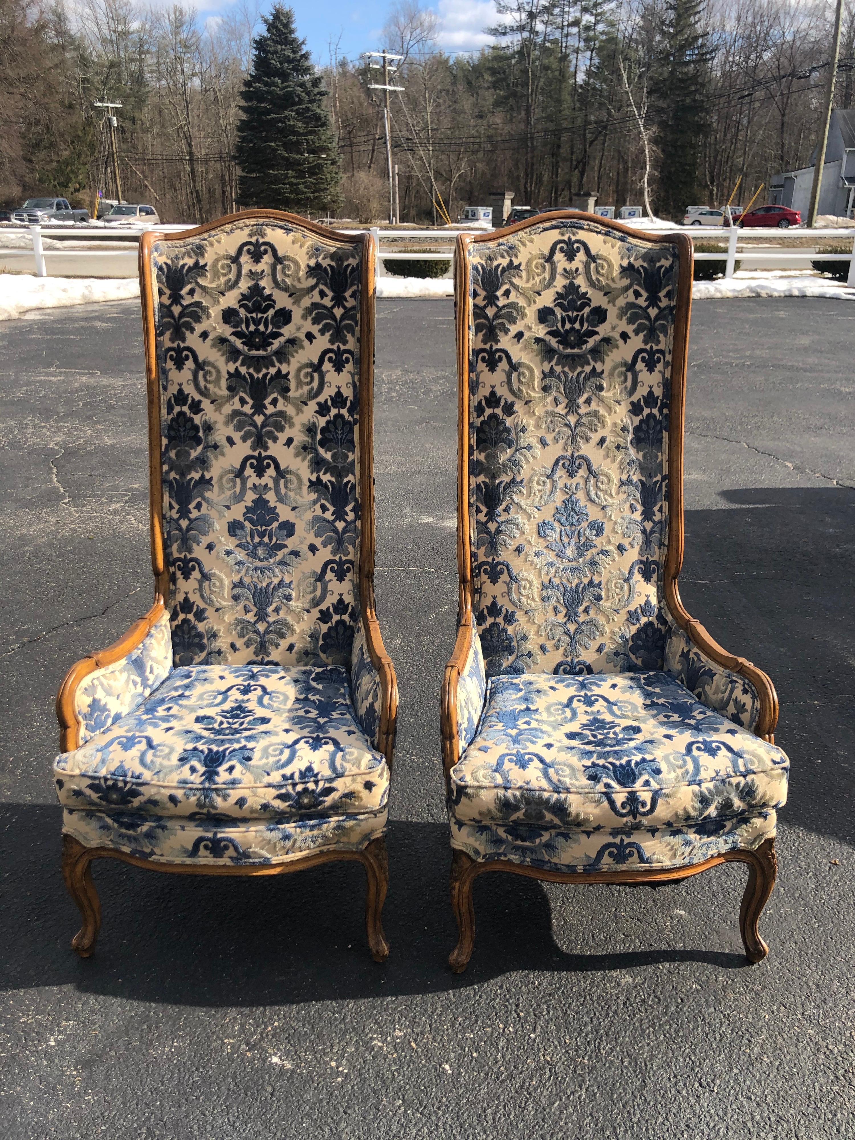 Pair of high back Hollywood Regency Throne chairs.
Impeccable original tapestry brocade. Solid wooden construction.