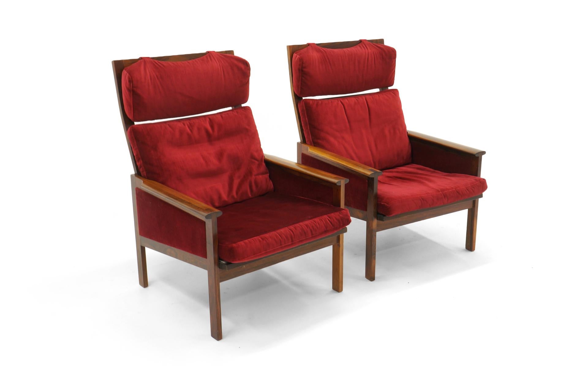 Pair of Danish modern high-back rosewood lounge chairs by Illum Wikkelso for Niels Eilersen A/S, 1960s. Eilersen label, Danish control sticker.