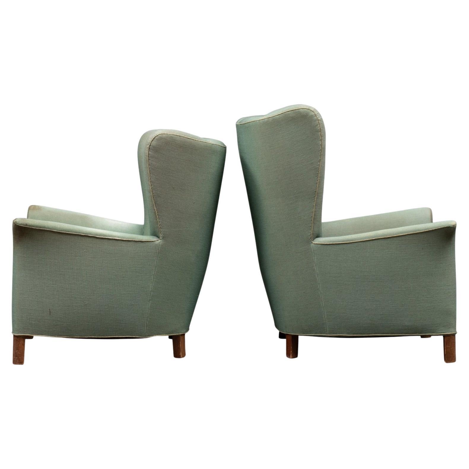 Pair of High + Low Back 1940s Wingback Lounge Chairs