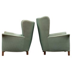 Pair of High + Low Back 1940s Wingback Lounge Chairs