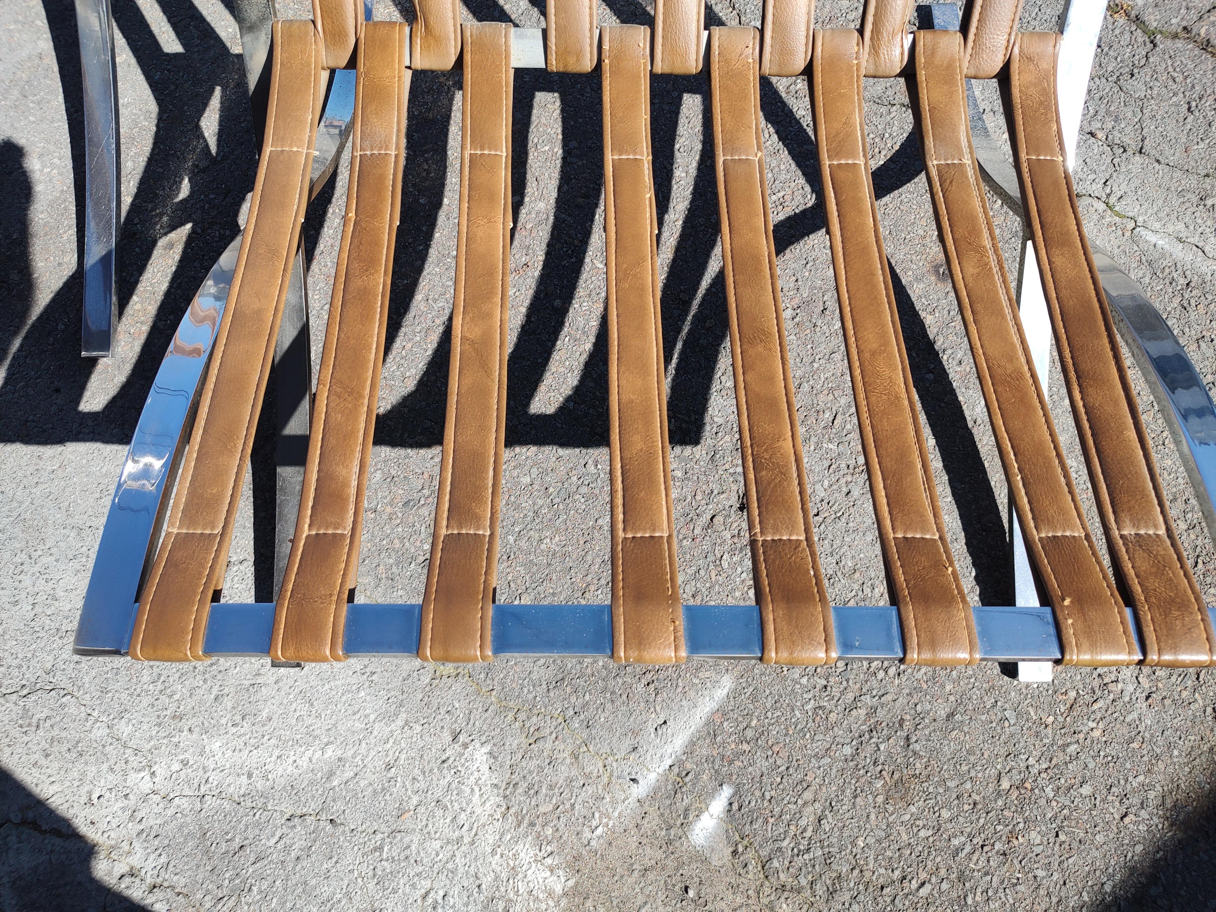 Steel Pair of High Quality Barcelona Lounge Chairs with Brown Naughahyde Vinyl Seats For Sale