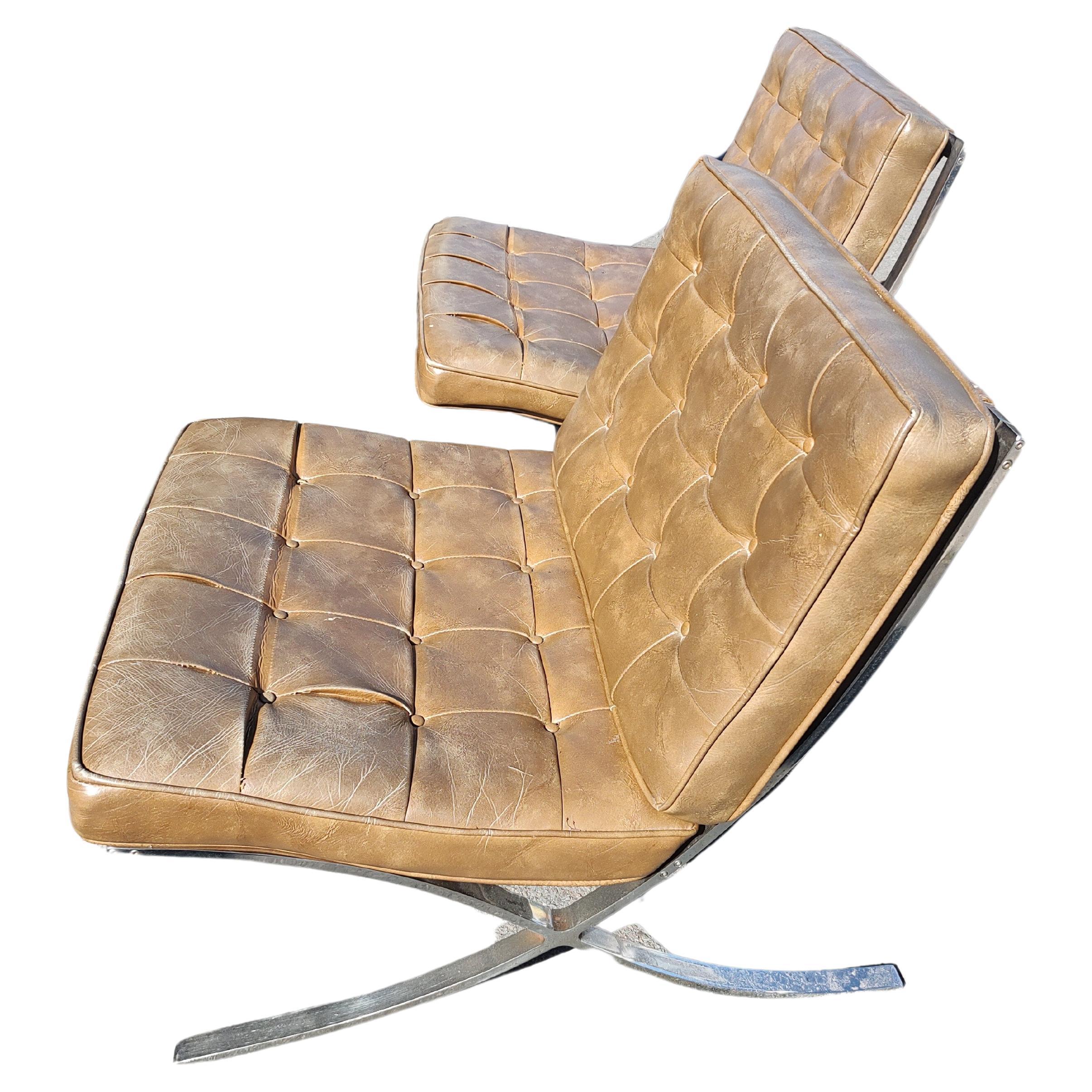 American Pair of High Quality Barcelona Lounge Chairs with Brown Naughahyde Vinyl Seats For Sale