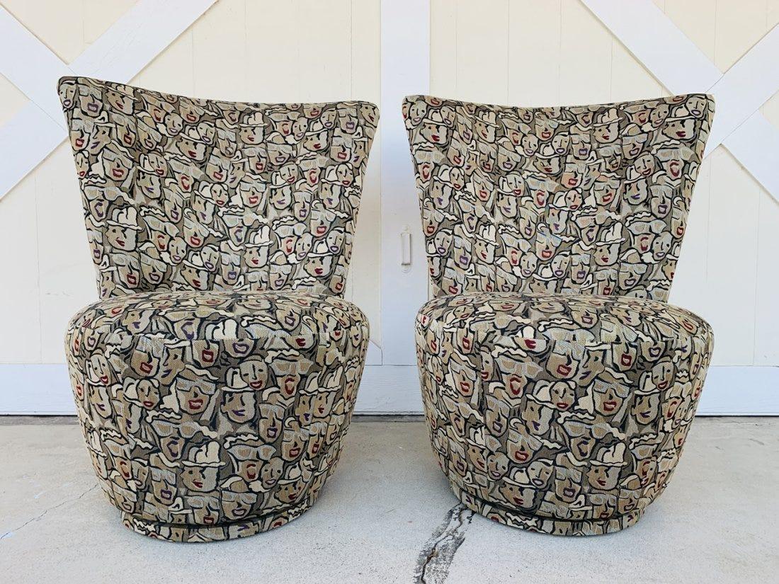 Pair of highback swivel chairs designed and manufactured in the US by Carter Furniture.

The chairs were custom made for James Wilson and custom upholstered, the name of the fabric pattern is Hot Lips Cherry.

The chairs are in very good