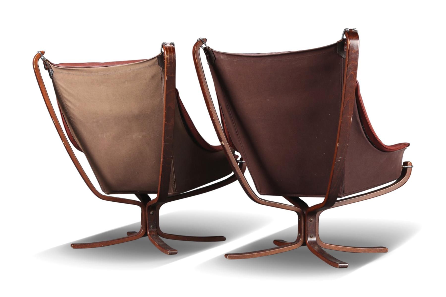 Other Pair of Highback Winged Falcon Chairs with Ottomans in Rust Leather