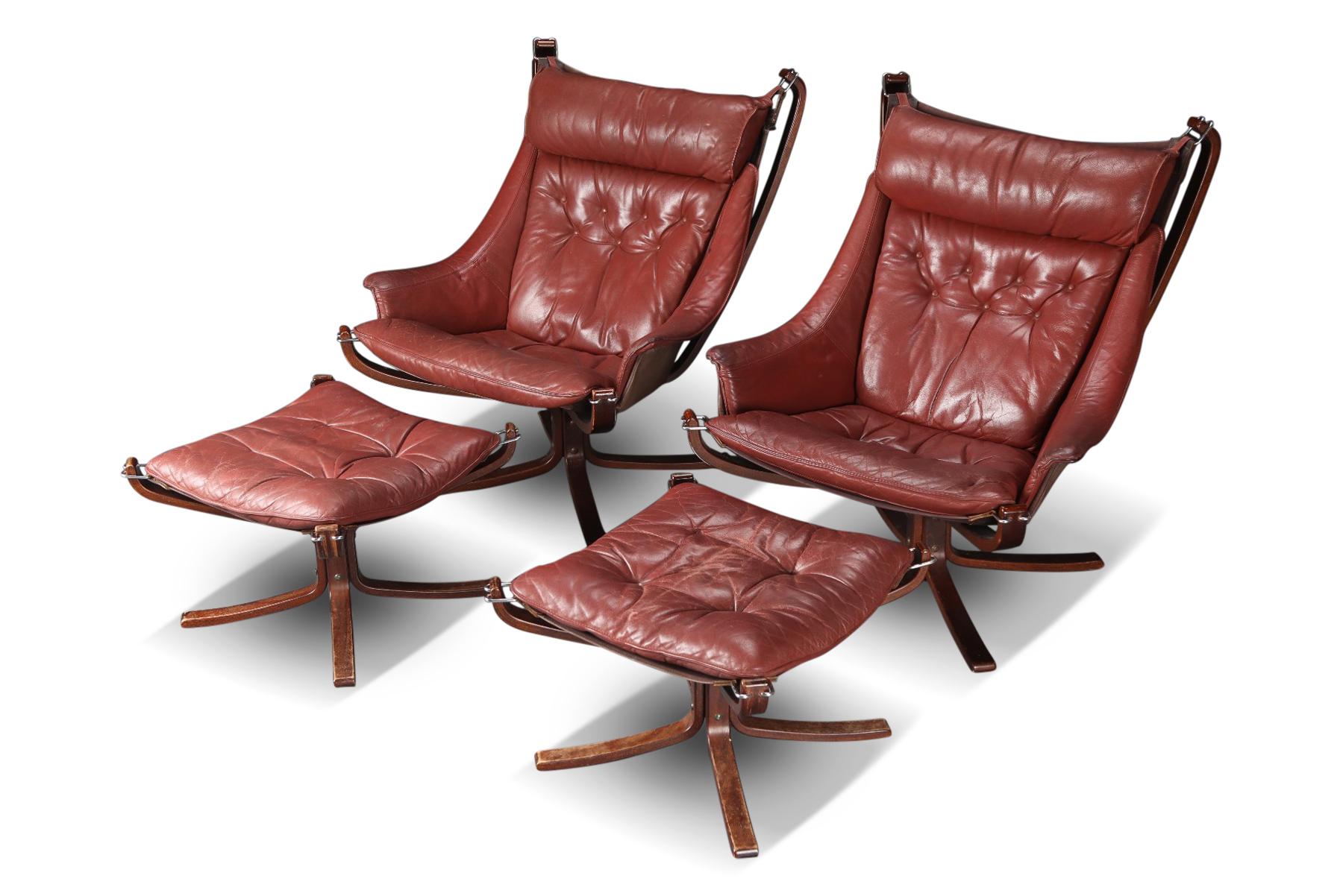 Pair of Highback Winged Falcon Chairs with Ottomans in Rust Leather 1