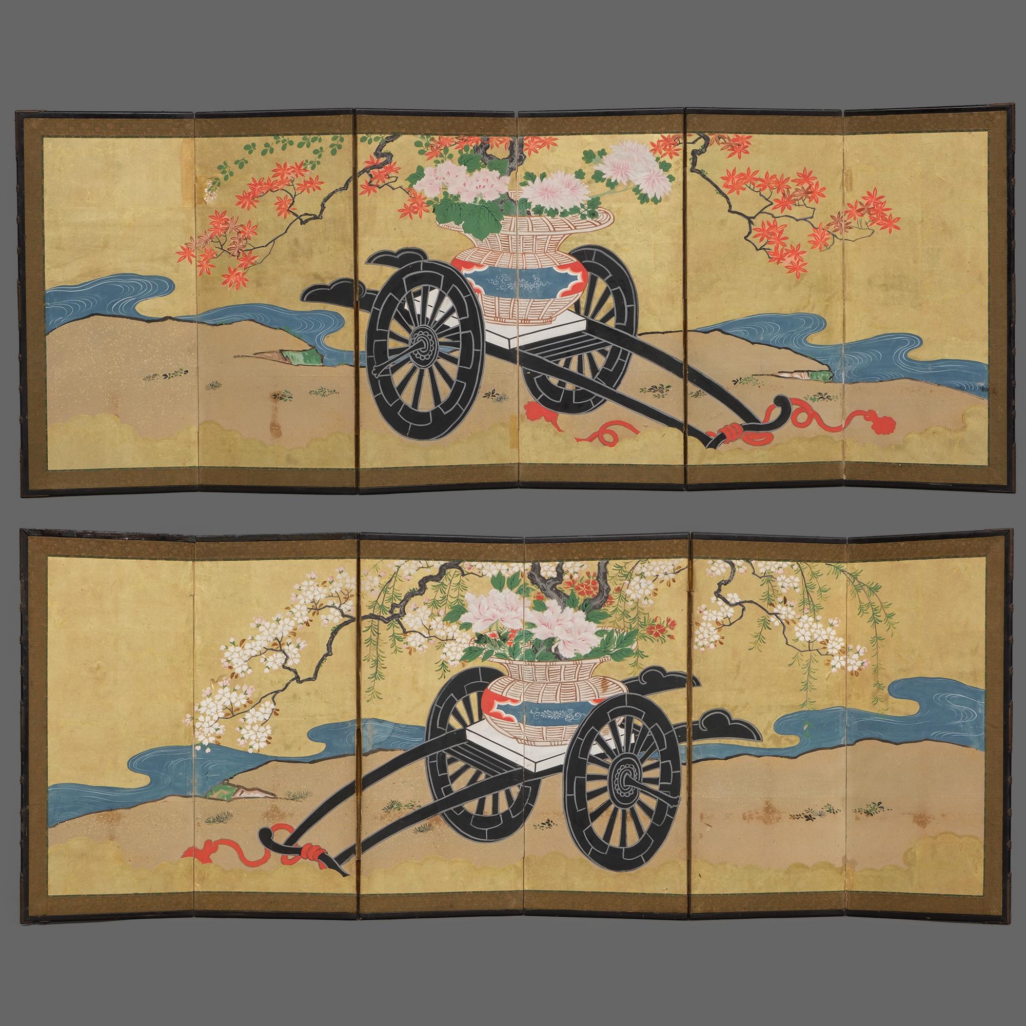 An amazing pair of six-panel hinagata byôbu (doll festival folding screens) with a continuous painting on gold leaf showcasing flower carts (hana’guruma) at the edge of a winding river.
Both laden with a large bamboo basket (hanakago) overflowing