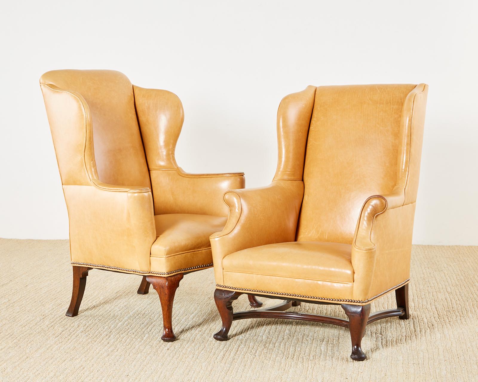 English Pair of His and Hers Queen Anne Style Leather Wingbacks