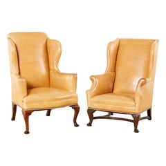 Pair of His and Hers Queen Anne Style Leather Wingbacks
