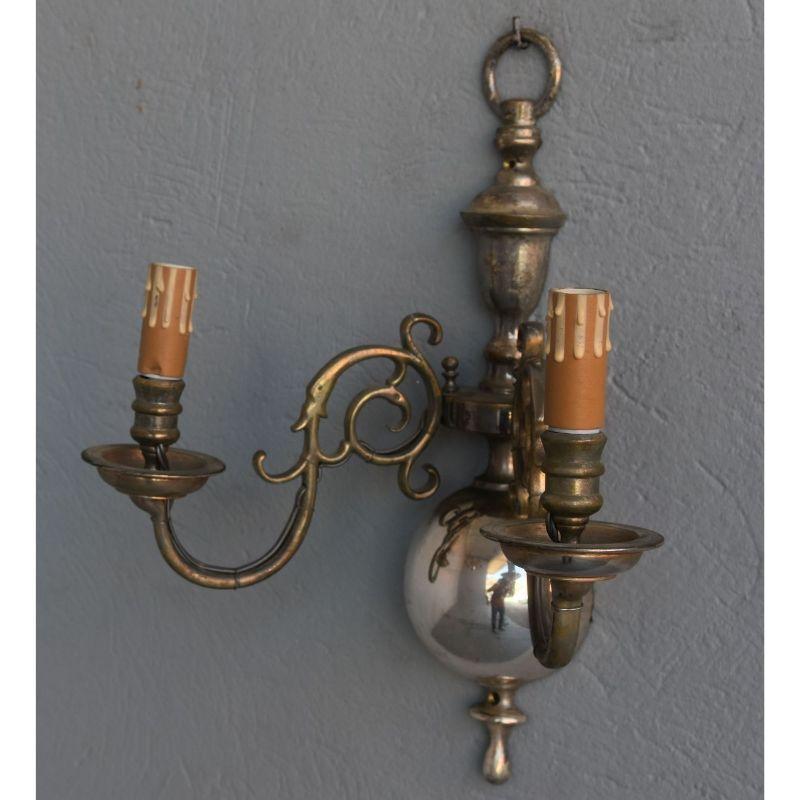 Pair of Dutch sconces in silvered bronze 2 lights measuring 46 cm by 35 cm and 20 cm deep.

Additional information:
Material: Bronze
Style: 1940s to 1960s.
