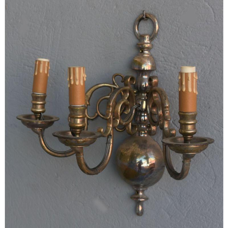 Pair of Dutch wall lights in silvered bronze 3 lights measuring 40 cm by 40 cm and 20 cm deep.

Additional information:
Material: Bronze
Style: 1940s to 1960s.