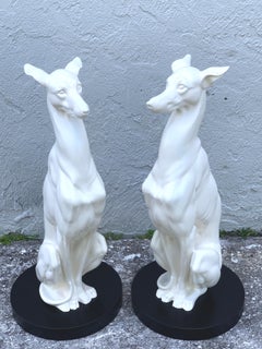 Paar schwarz-weiße Hollywood-Regency-Whippets