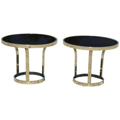 Pair of Hollywood Regency Brass and Black Glass Tables