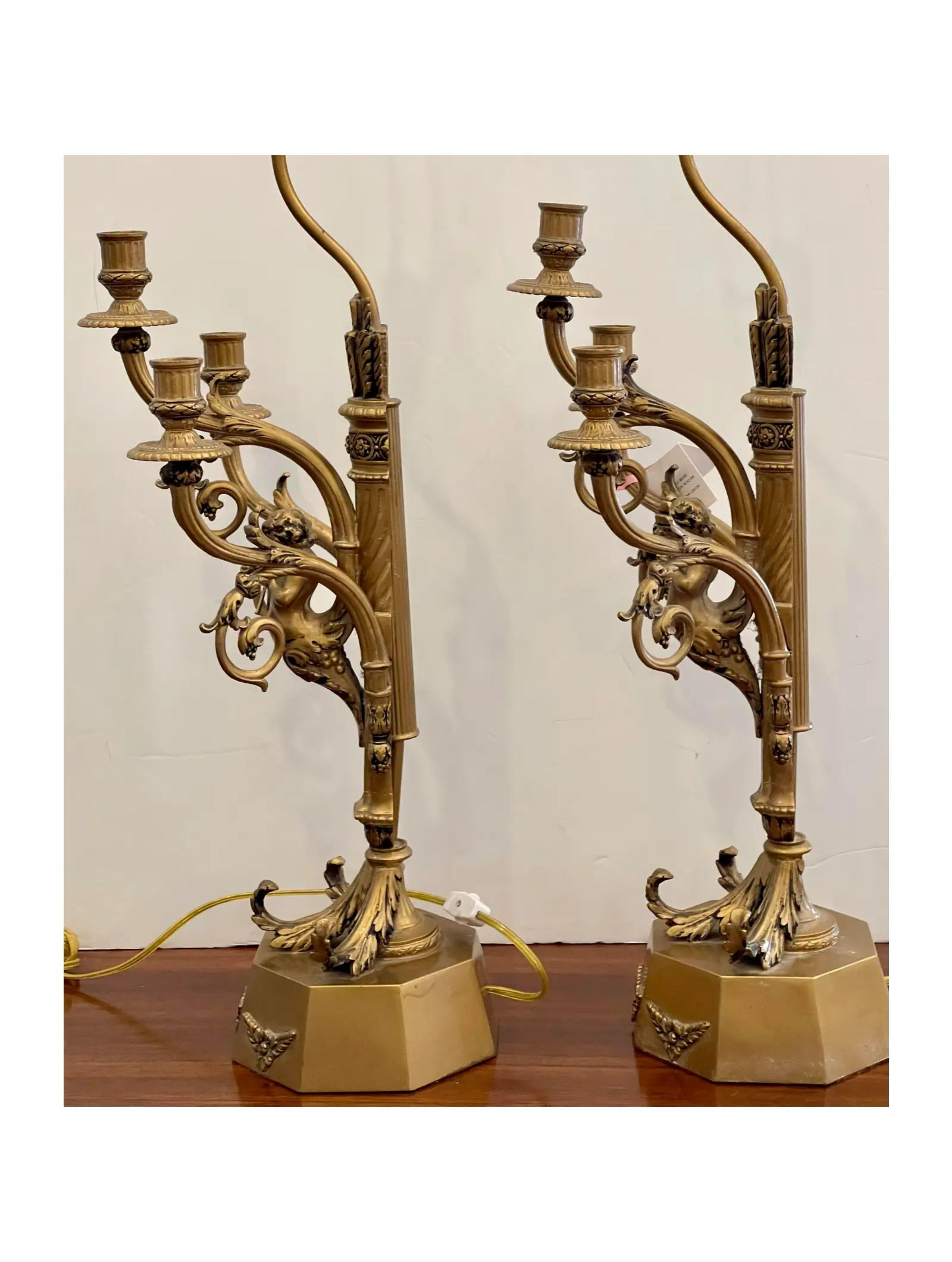 Bronze Pair of Hollywood Regency Candelabra Lamps with Trumpet Playing Putti For Sale