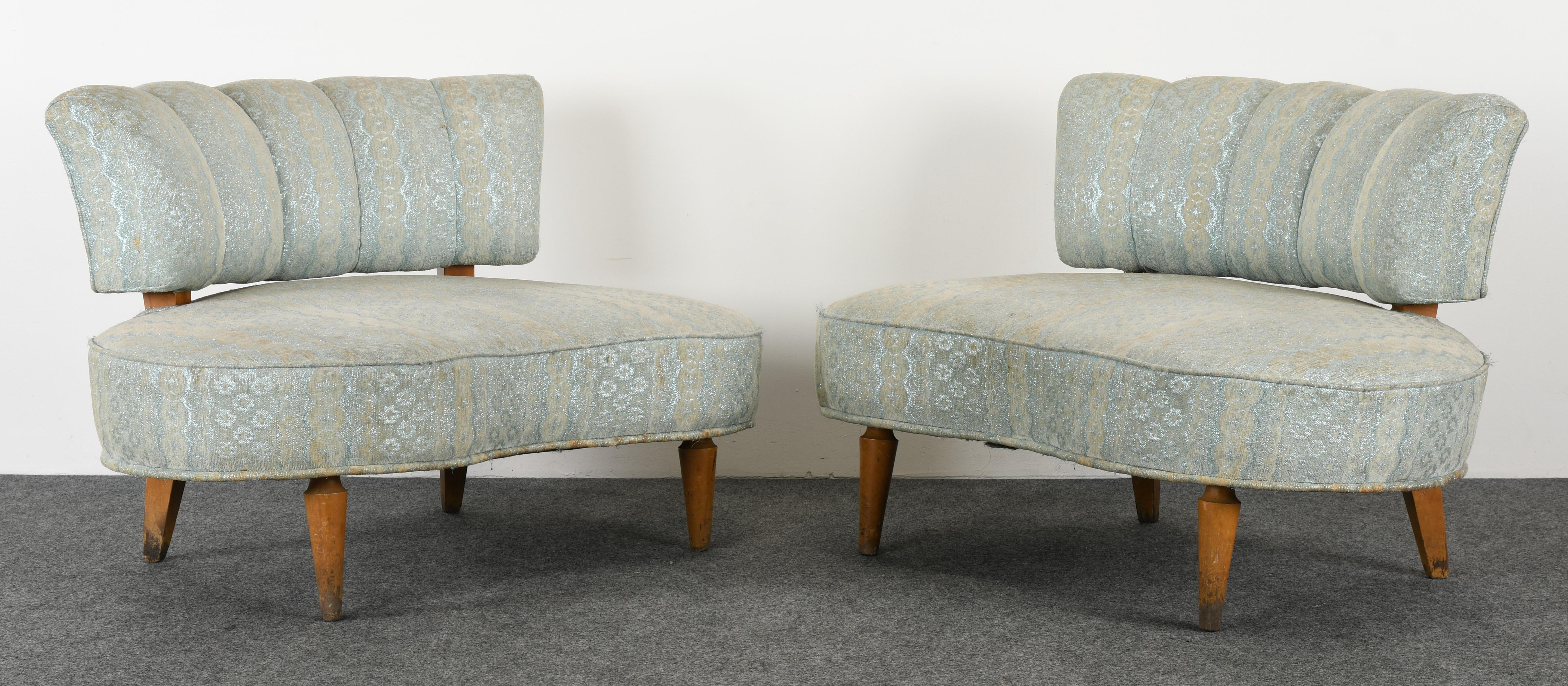 A wonderful pair of extra large scale upholstered chairs in the manner of Grosfeld House. The size of these are extra wide and can be considered settees. New upholstery and refinishing recommended. Structurally sound. Perfect chairs for