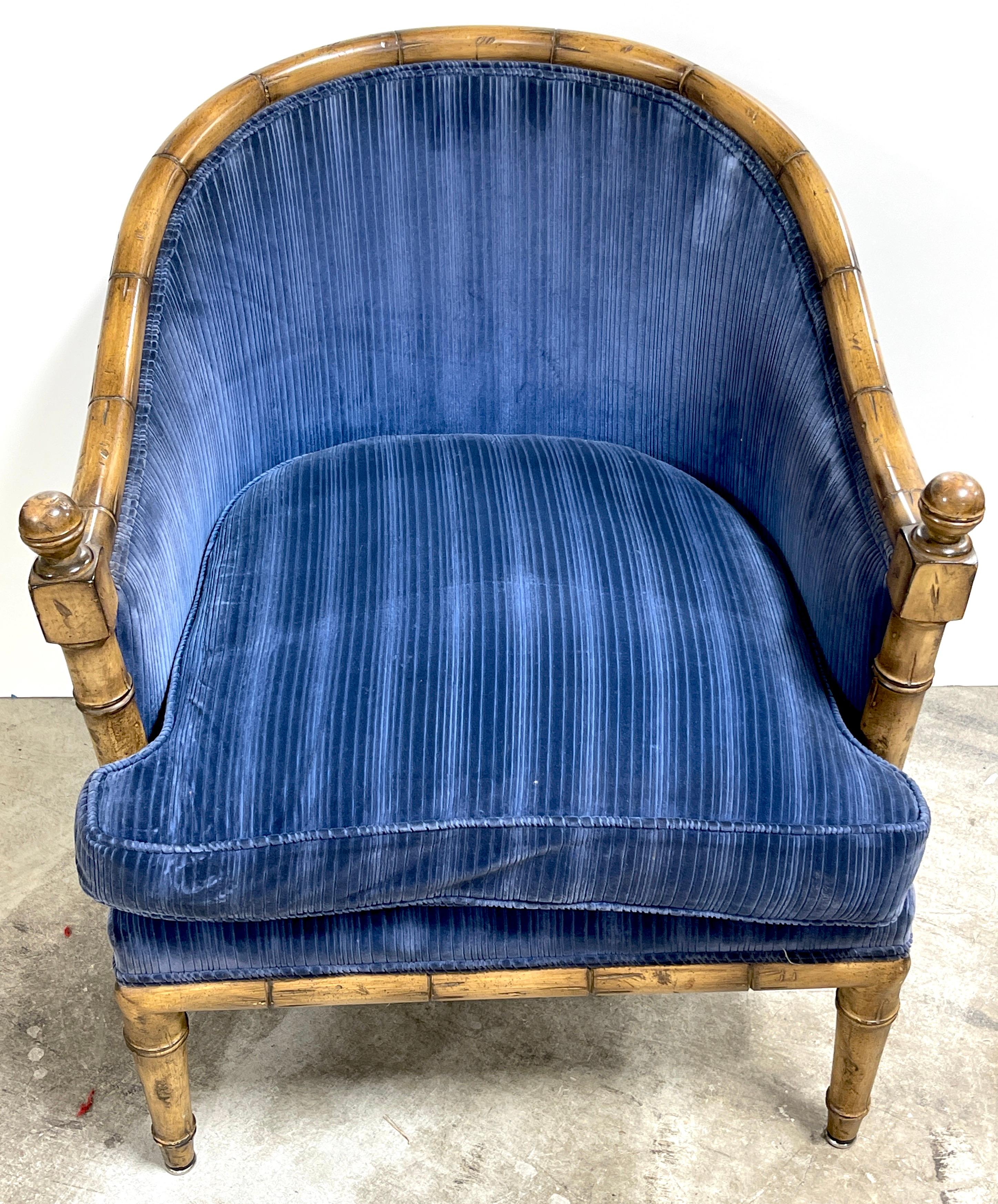 Pair of Hollywood Regency Faux bamboo carved & Polychromed club chair frames
USA, Circa 1960s
Reupholstery is recommended due to the age of the well cared for vintage fabric.


A pair of sleek and stylish hard to find, caved and polychromed
