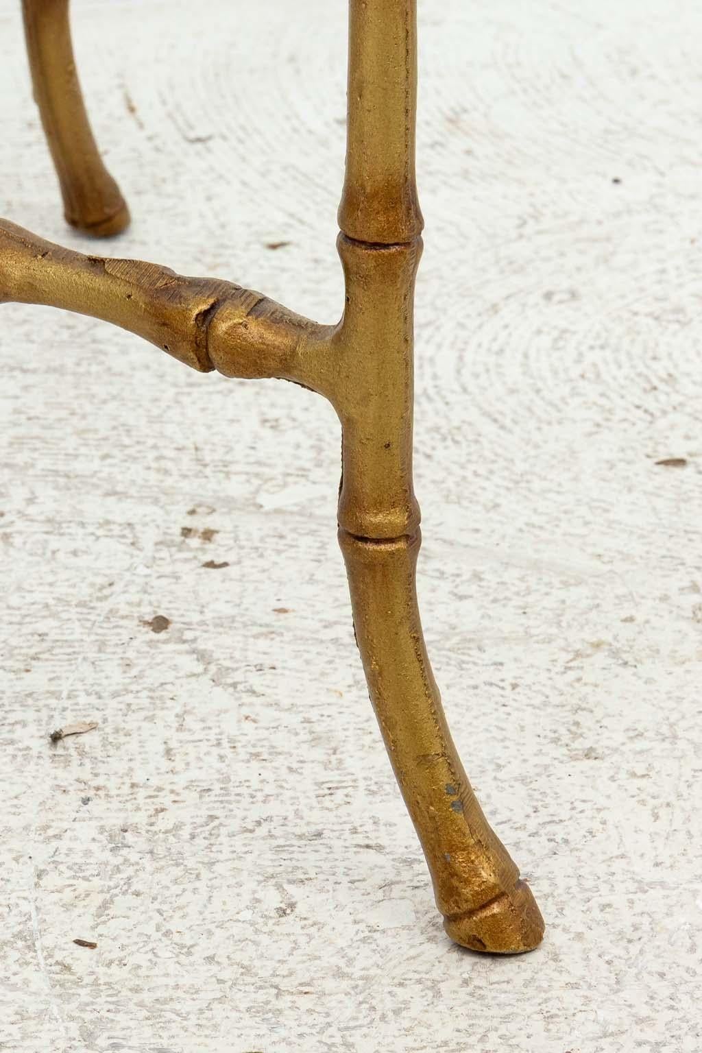 Pair of Hollywood Regency Faux Bamboo Maison Bagues Style Cocktail End Tables. Good overall condition. Few scratches to glass from age and use