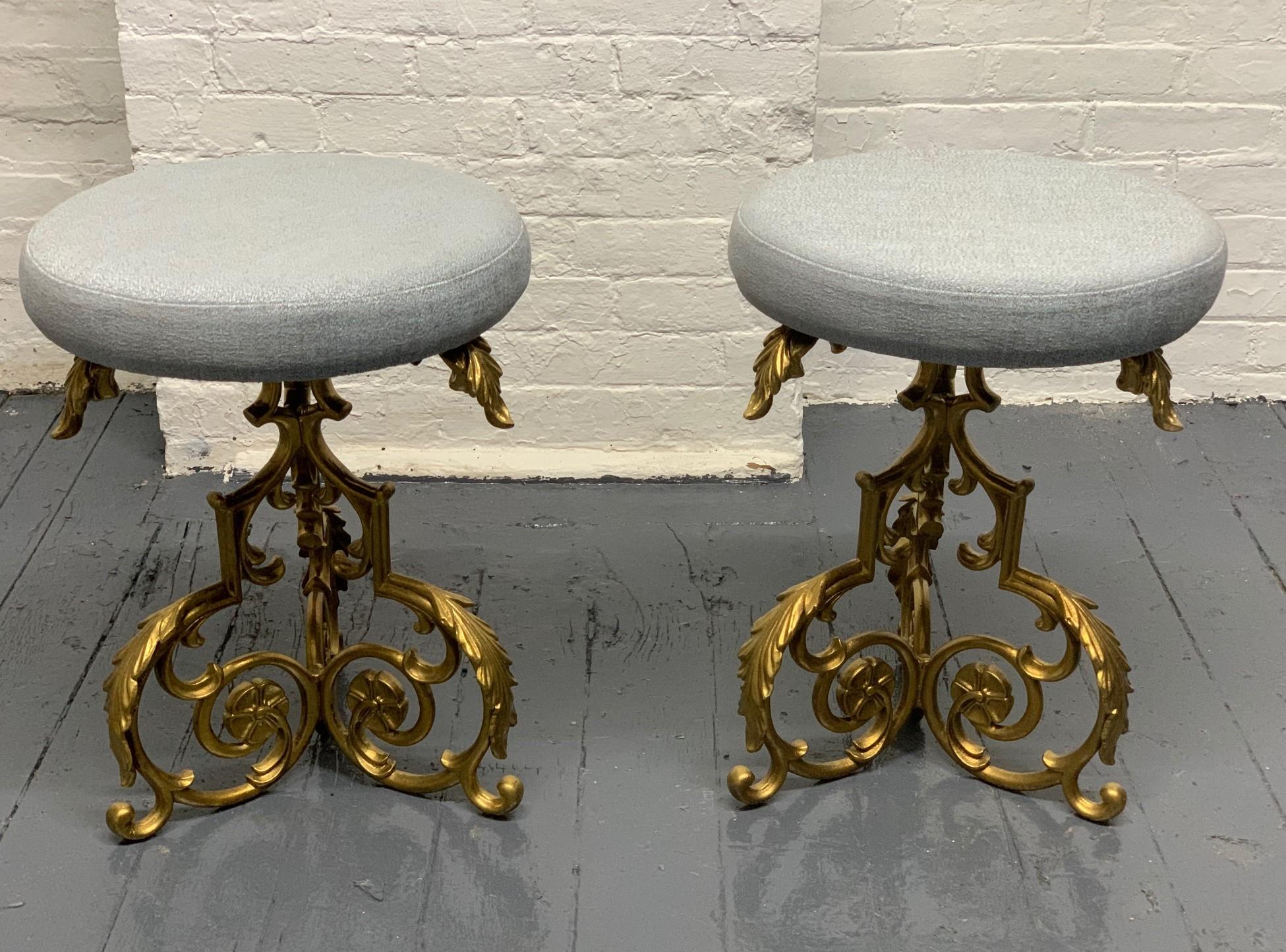 Pair of Hollywood Regency gold metal floral stools. Has round cushioned seats. Sturdy and comfortable.