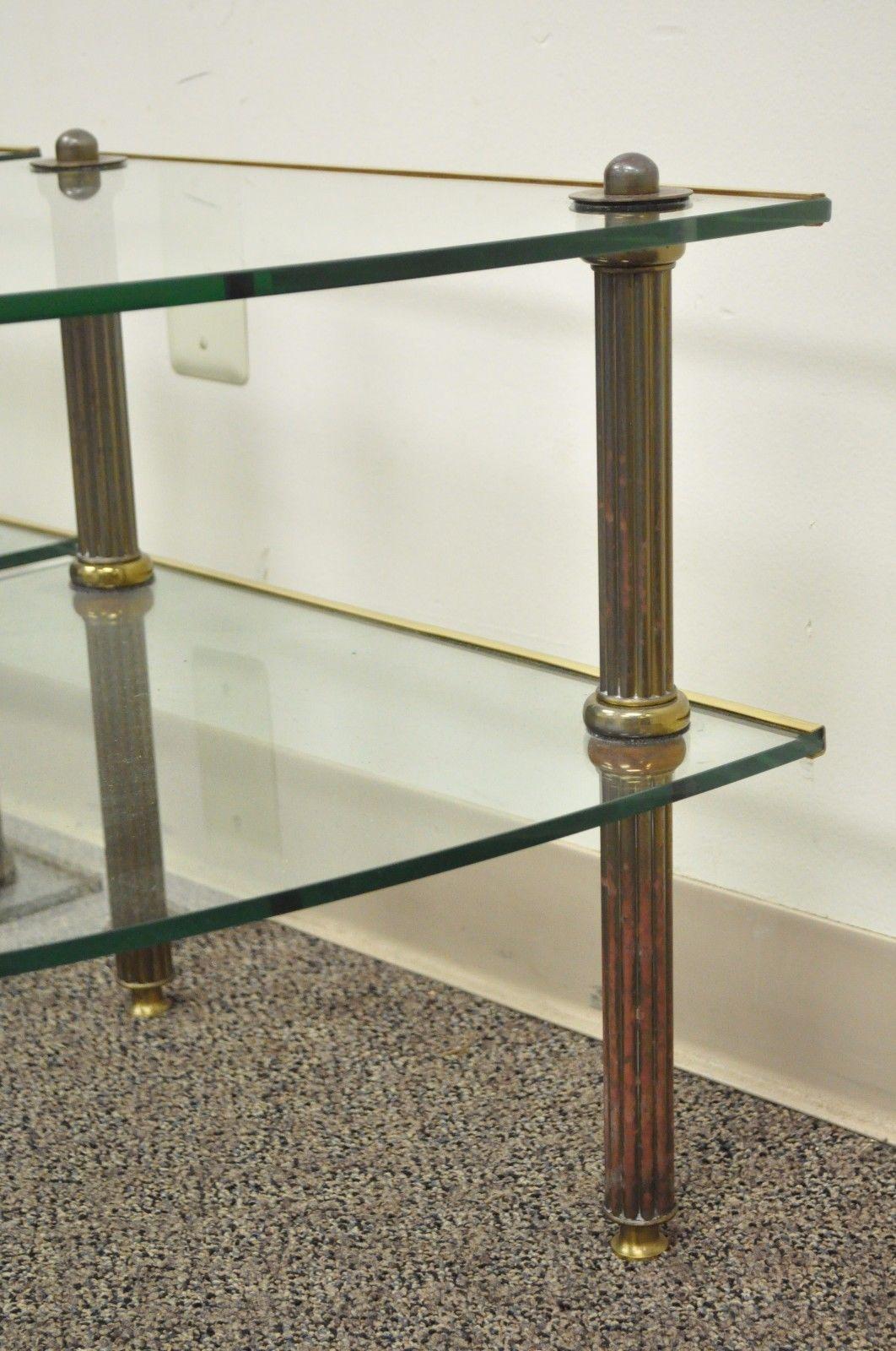 Pair of Hollywood Regency French Style Brass and Glass Two-Tier Side Tables In Good Condition In Philadelphia, PA