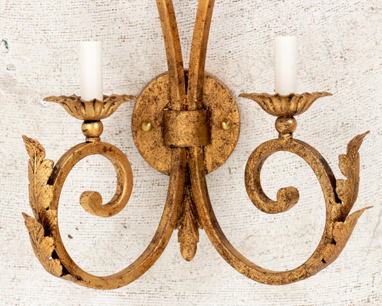 Pair of Hollywood Regency Gilded Iron Sconces For Sale at 1stDibs