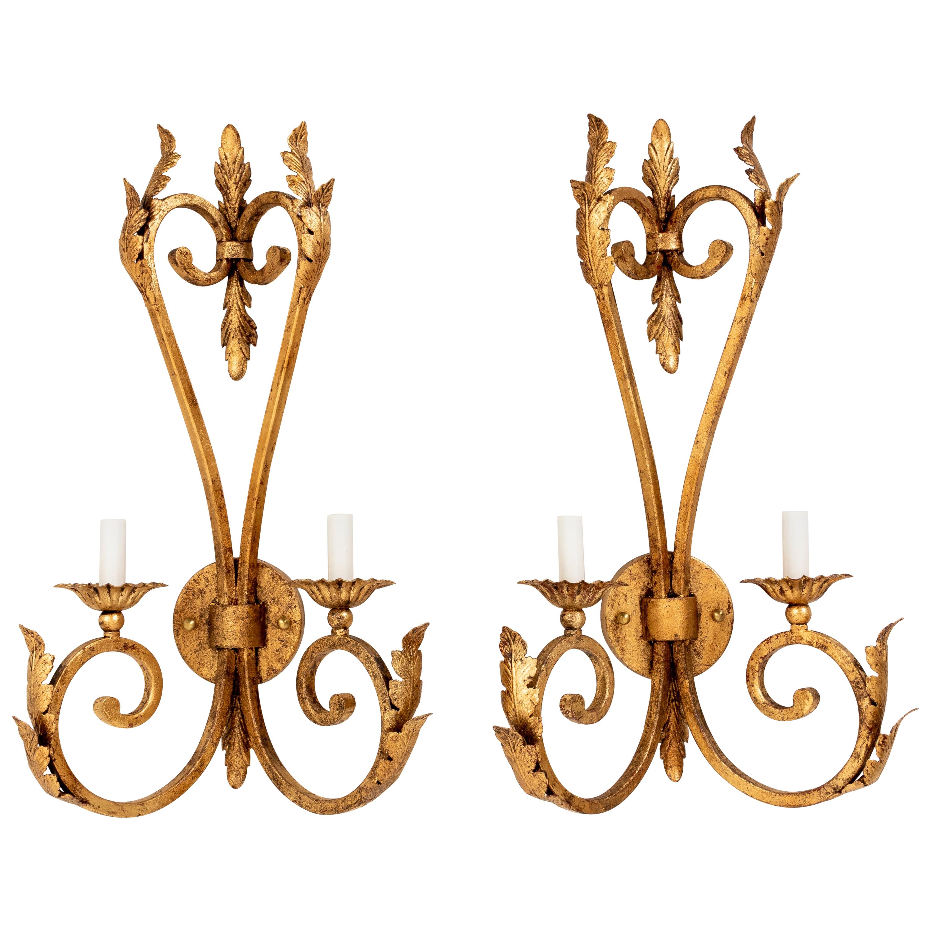 Pair of Hollywood Regency Gilded Iron Sconces For Sale