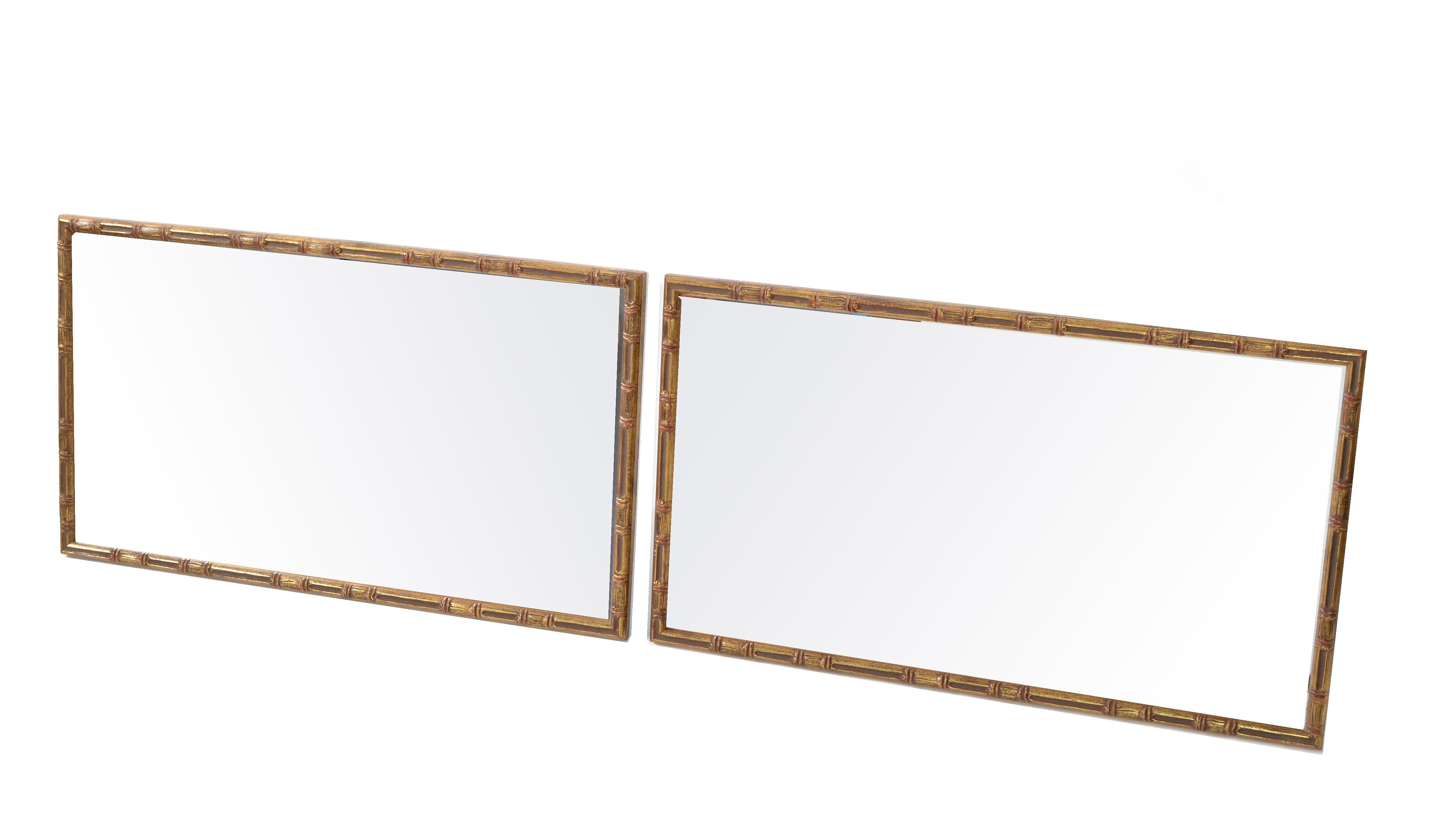 Gorgeous pair of wall mirrors in gilt finish faux bamboo.
Can be hung vertical.
Mirror Size: 14.25 x 26.25 inches.