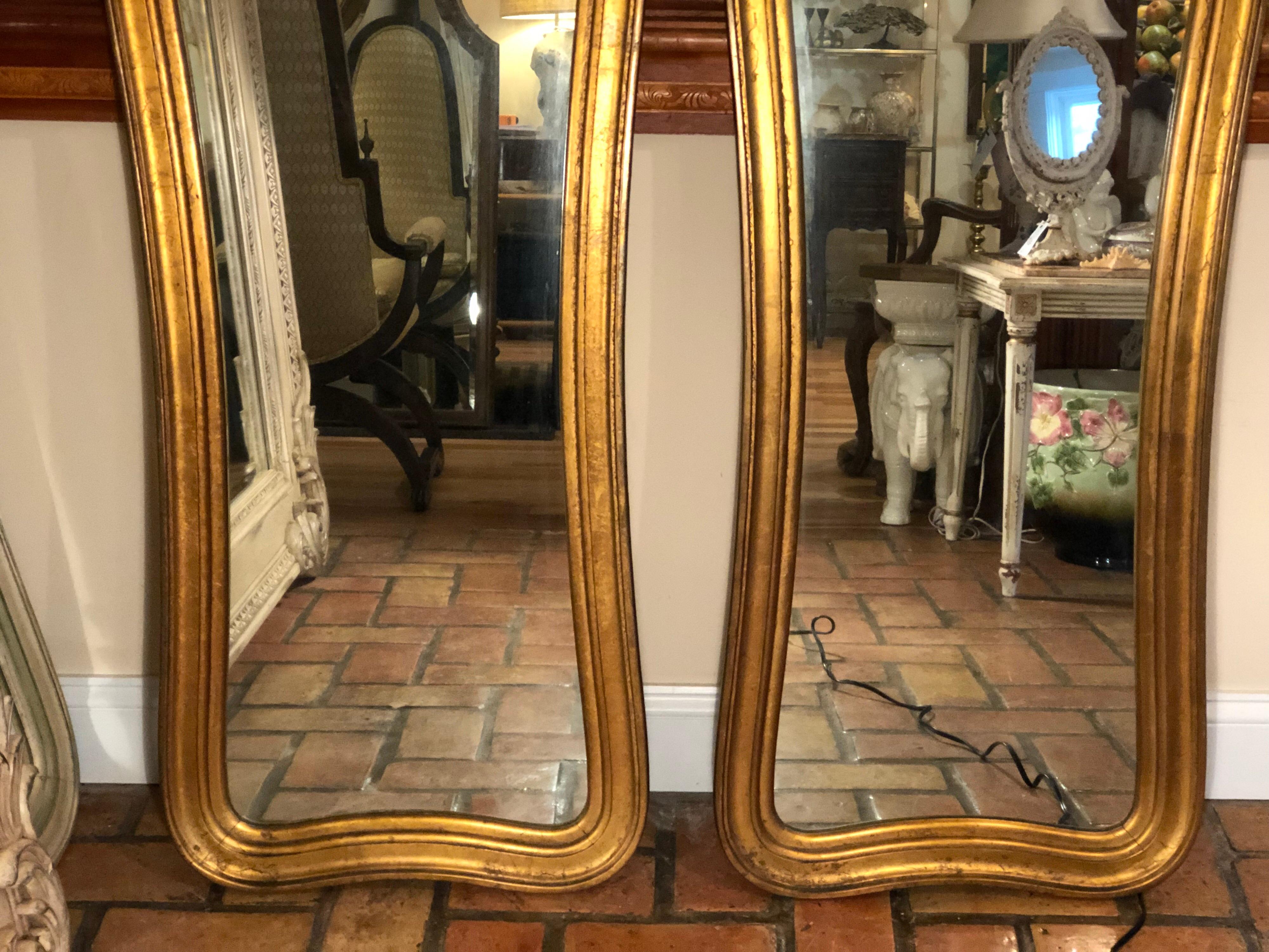 Wood Pair of Hollywood Regency Gilt Mirrors
